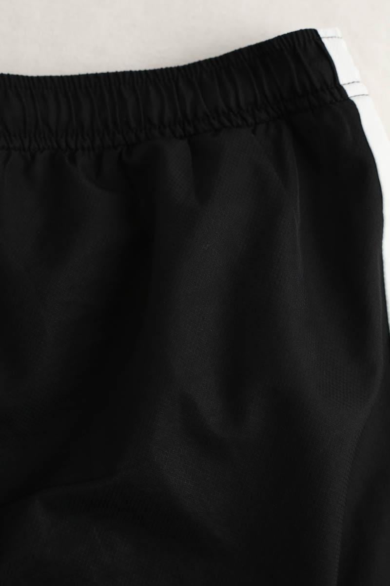Sports trousers LACOSTE - SECONDE MAIN Black