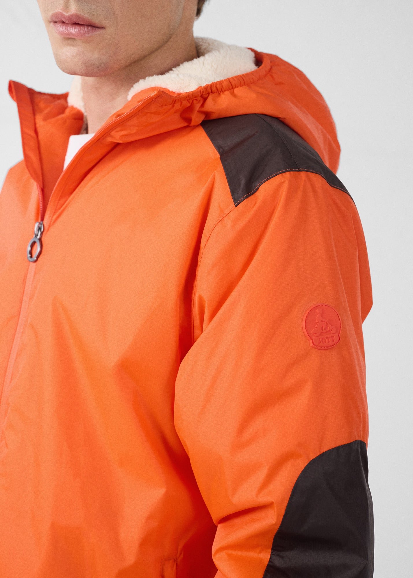 Sherpa-lined waterproof coat. JOTT Red