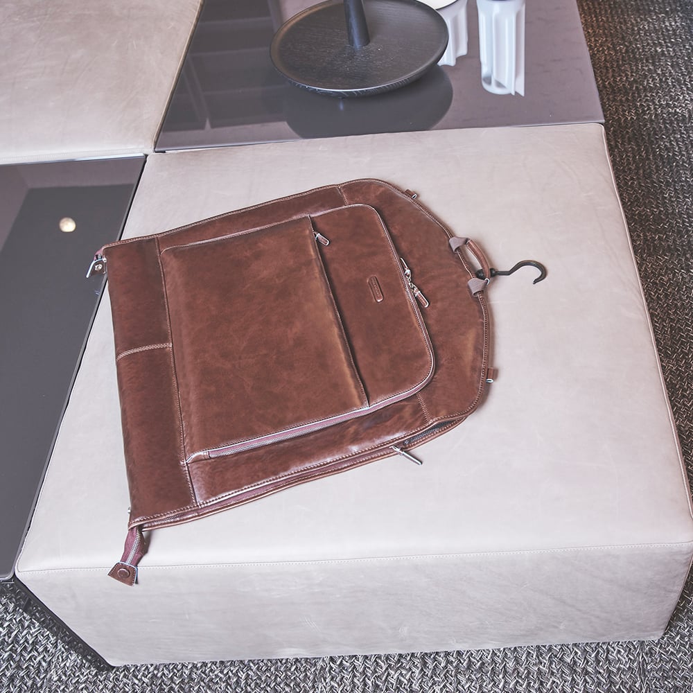 Travel garment bag with leather hook PIQUADRO Brown