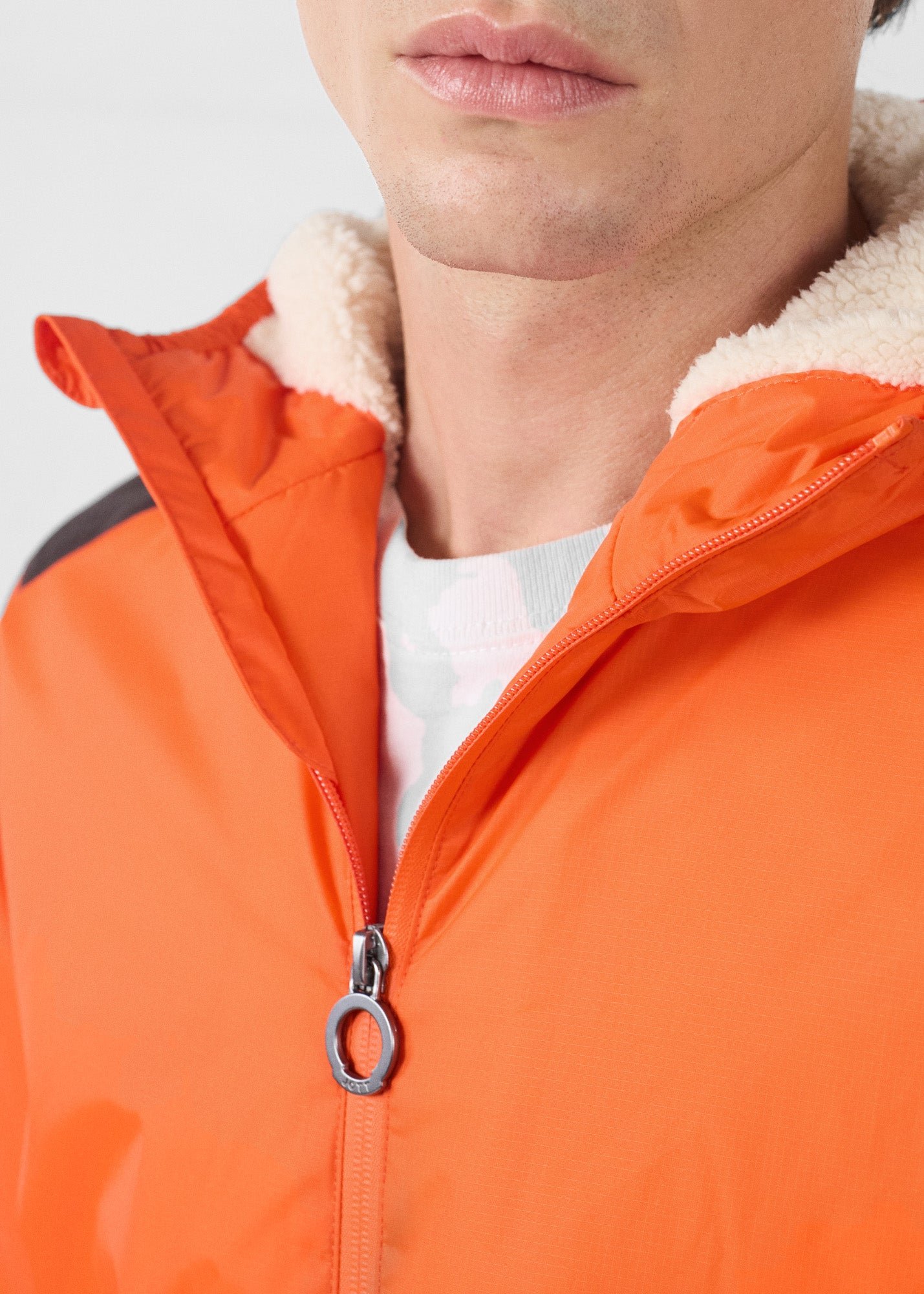 Sherpa-lined waterproof coat. JOTT Red