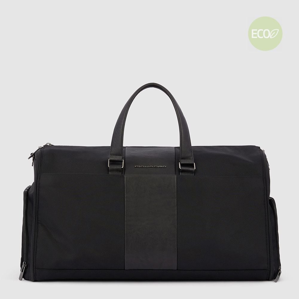 Weekend bag for hanging garments made from recycled materials with shoe compartment and laundry bag. PIQUADRO Black