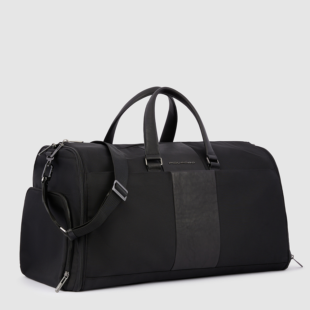 Weekend bag for hanging garments made from recycled materials with shoe compartment and laundry bag. PIQUADRO Black