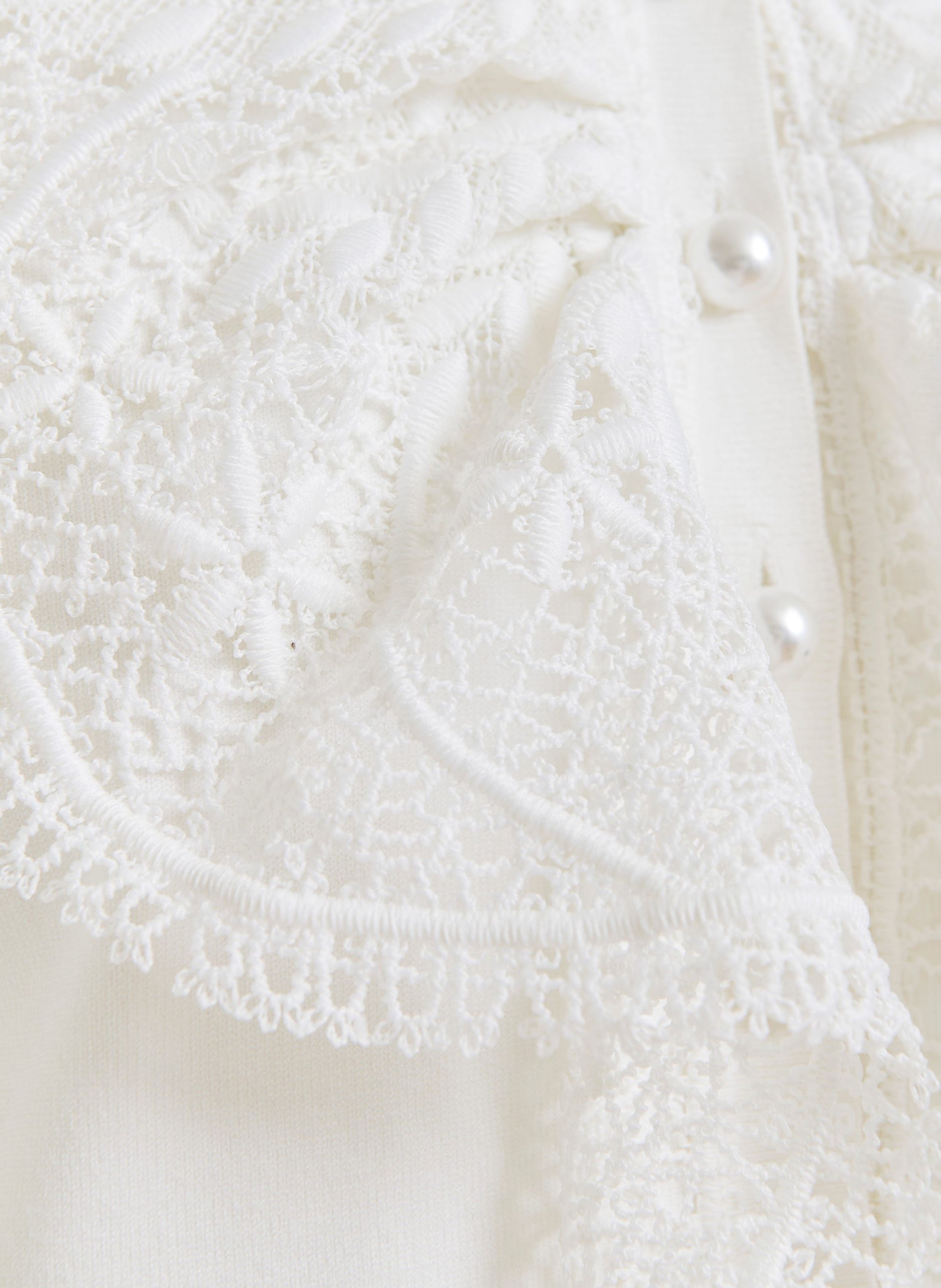 Polo sans manches à broderies fantaisies ESSENTIEL ANTWERP Blanc