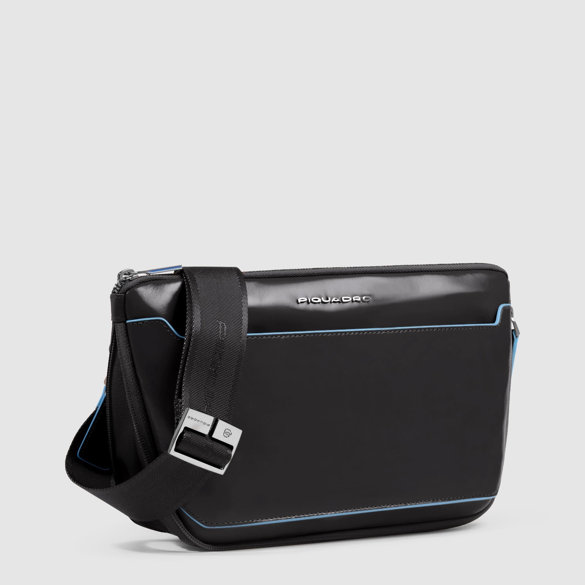 Flat expandable bum bag with repositionable shoulder strap attachments and pocket for airpods® Black