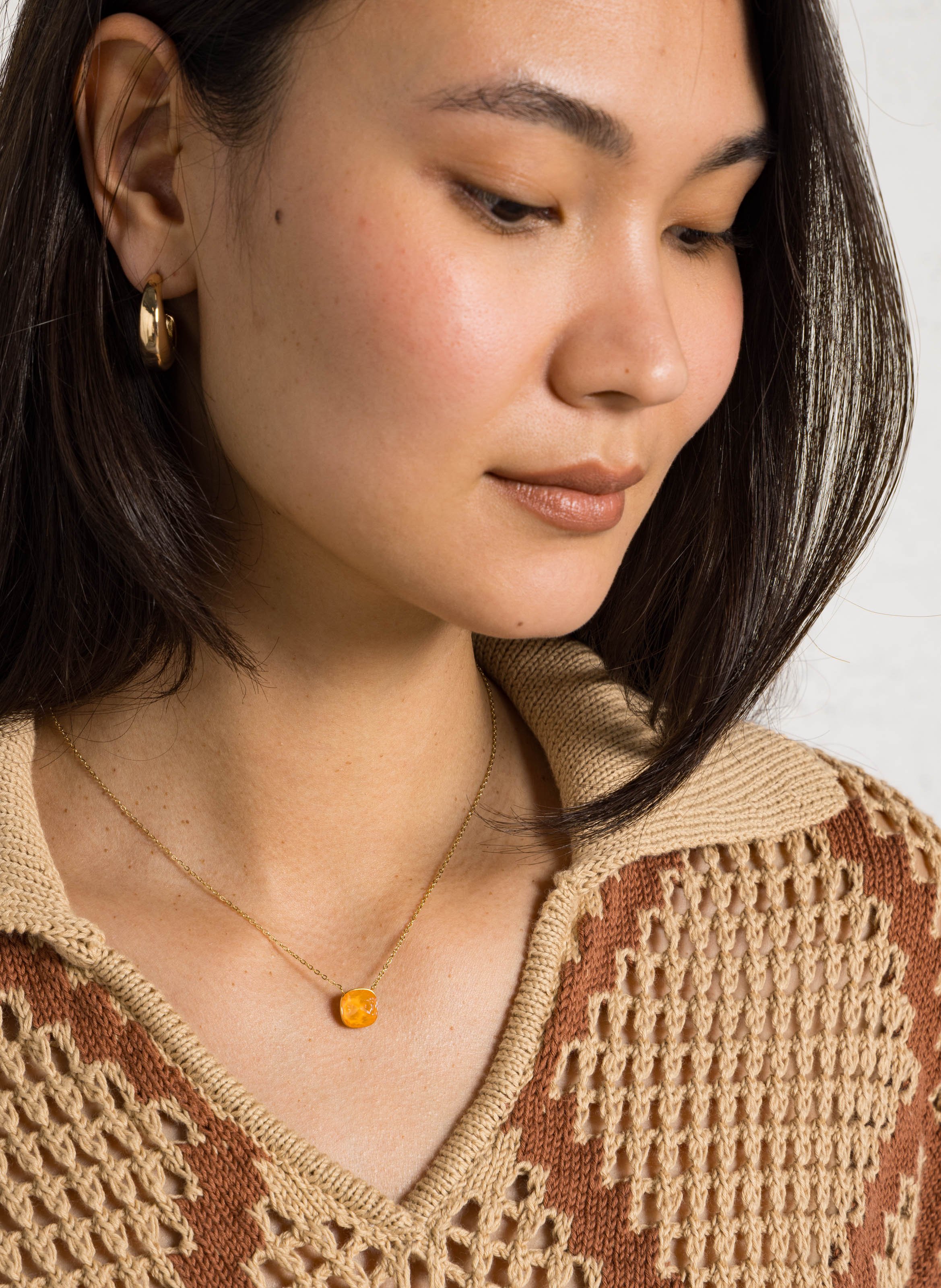 Collier en acier AU PRINTEMPS PARIS Orange