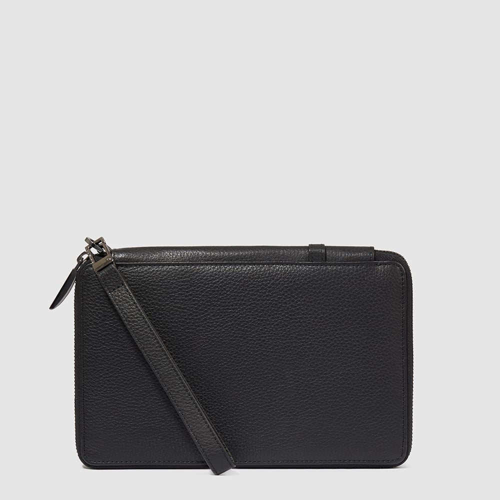 Zippered travel document holder with credit card slots, pen loop, and removable section. PIQUADRO Black