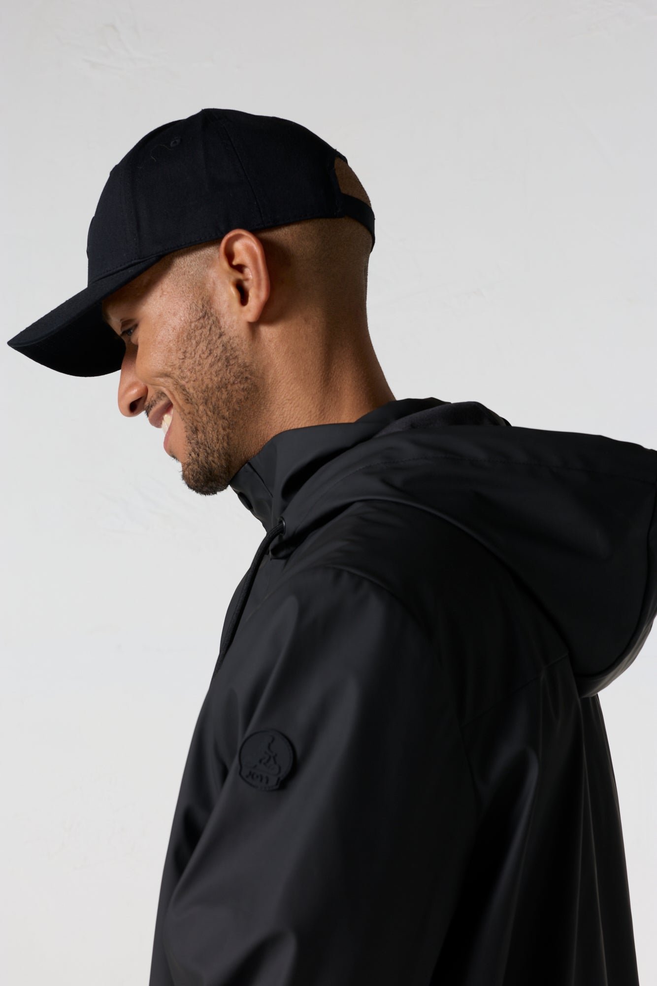 Denis unisex mid-length raincoat JOTT Black