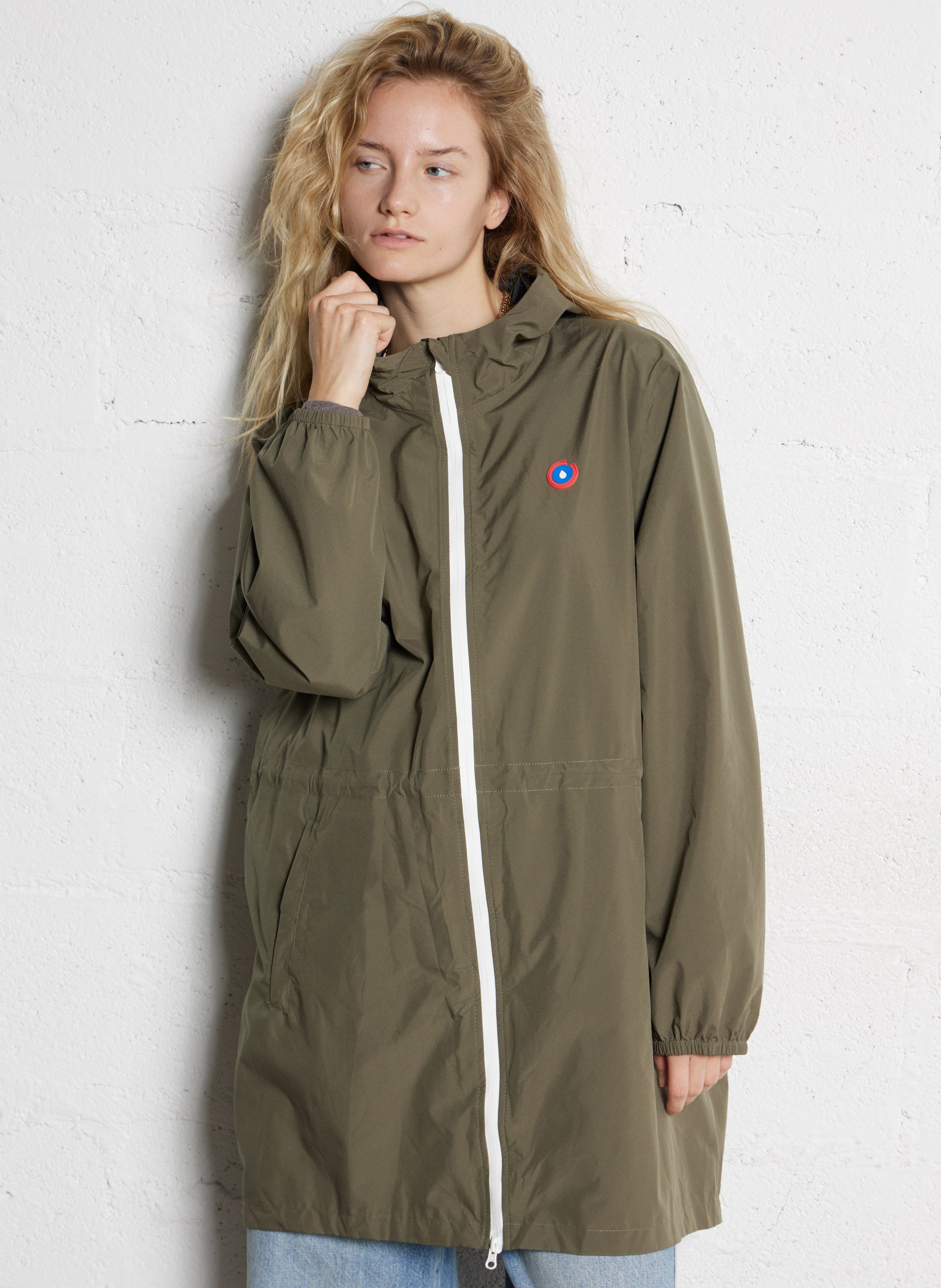 Lange regenjas met capuchon, om te vormen tot rugzakje FLOTTE