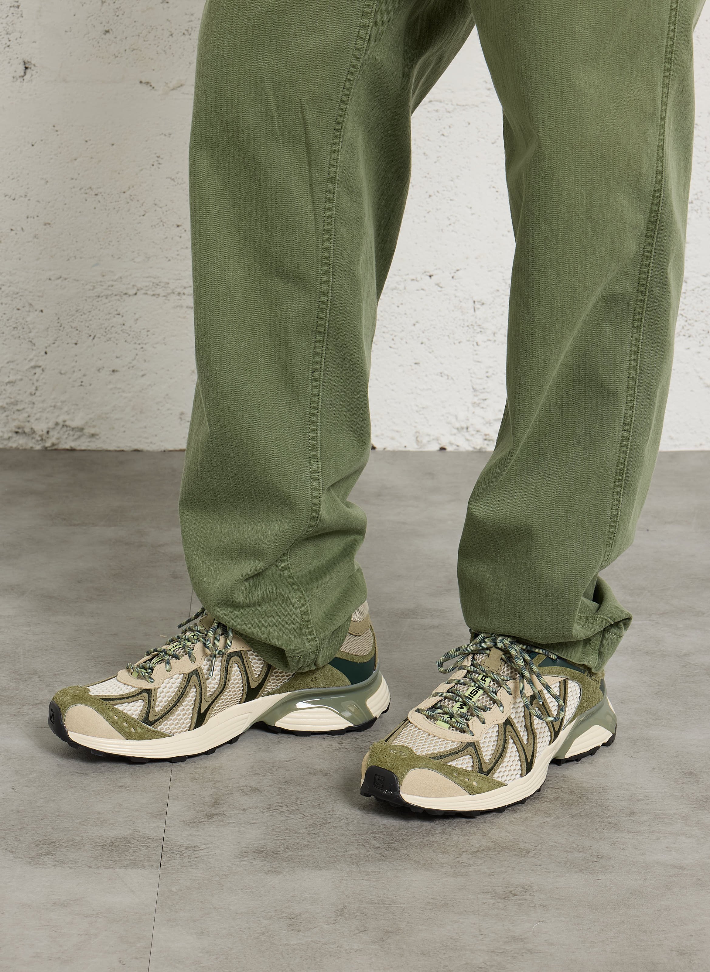 Baskets basses en cuir mélangé SALOMON Vert