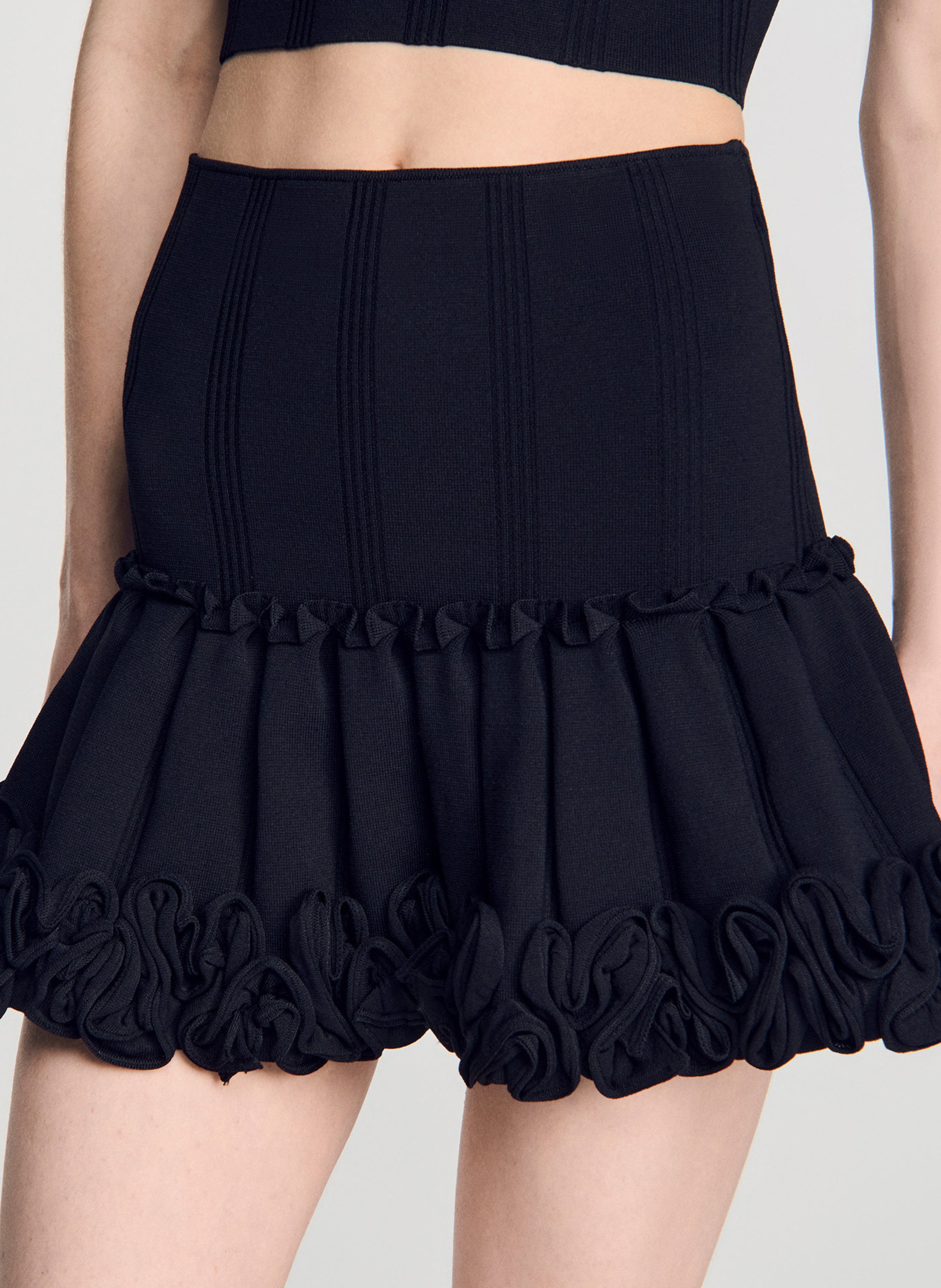 Jupe courte ajustée unie SANDRO Noir