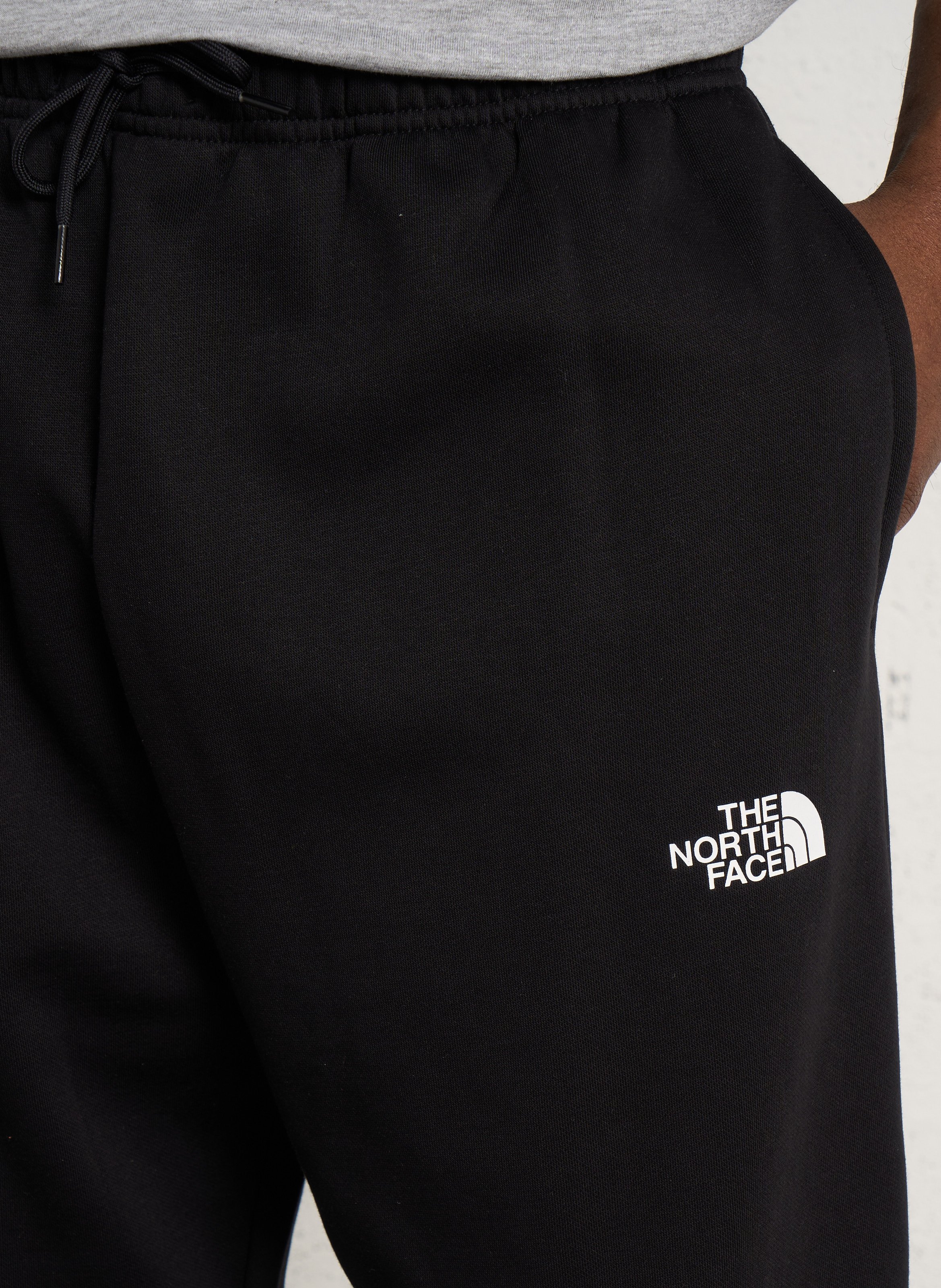 Solid color tapered joggers THE NORTH FACE Black