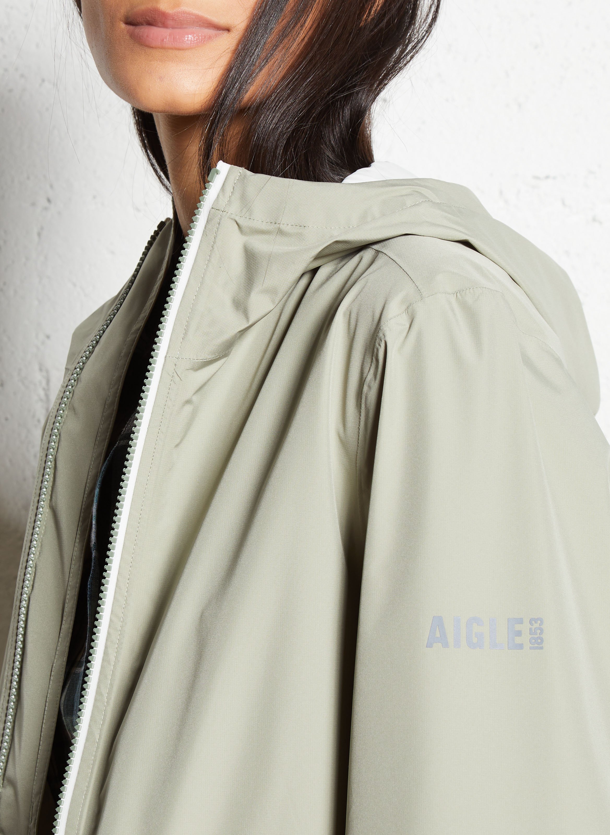 Buttoned and zipped high-neck fitted raincoat AIGLE Green
