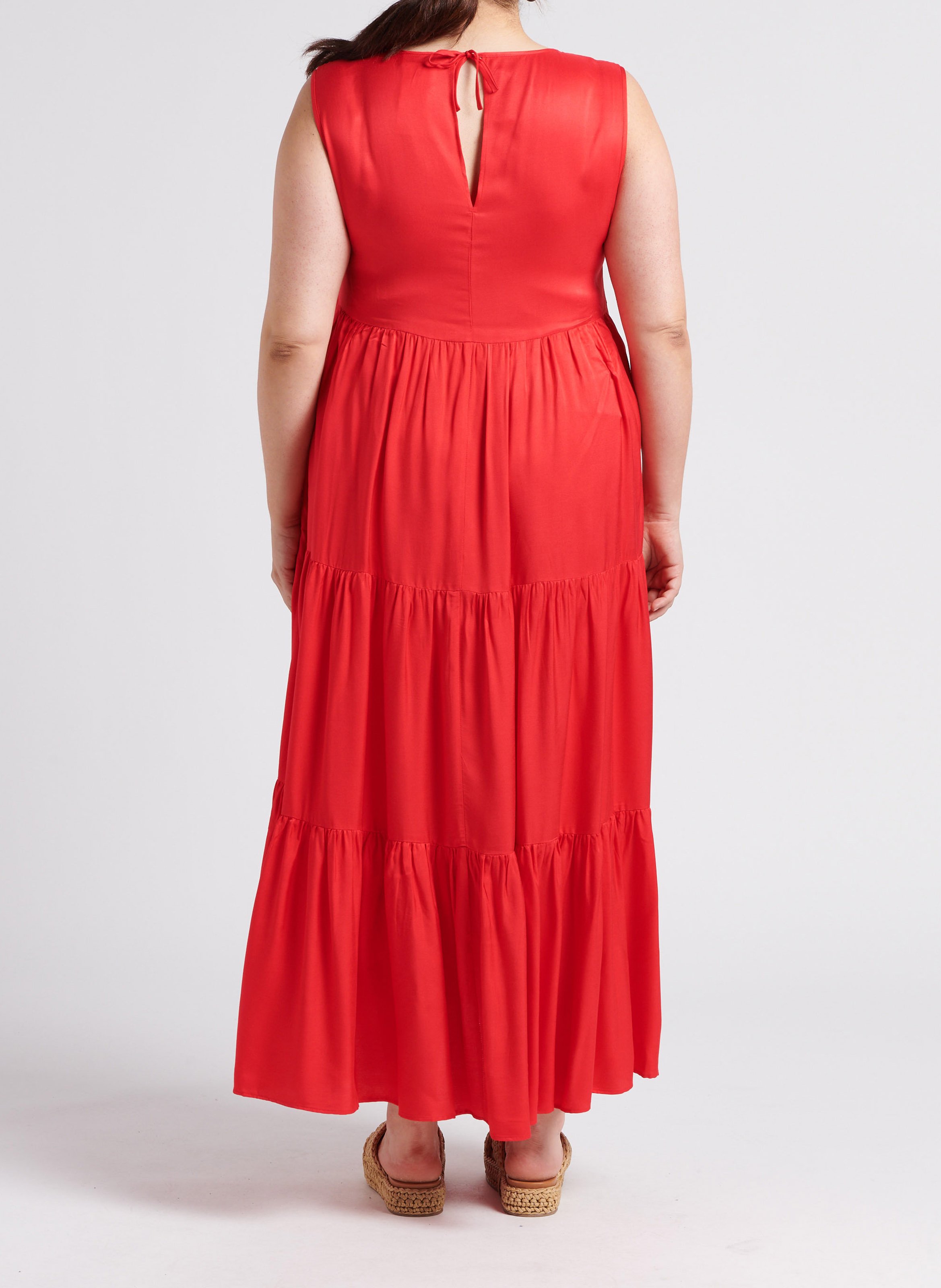 Lange jurk met uitlopende rok en V-hals Rood