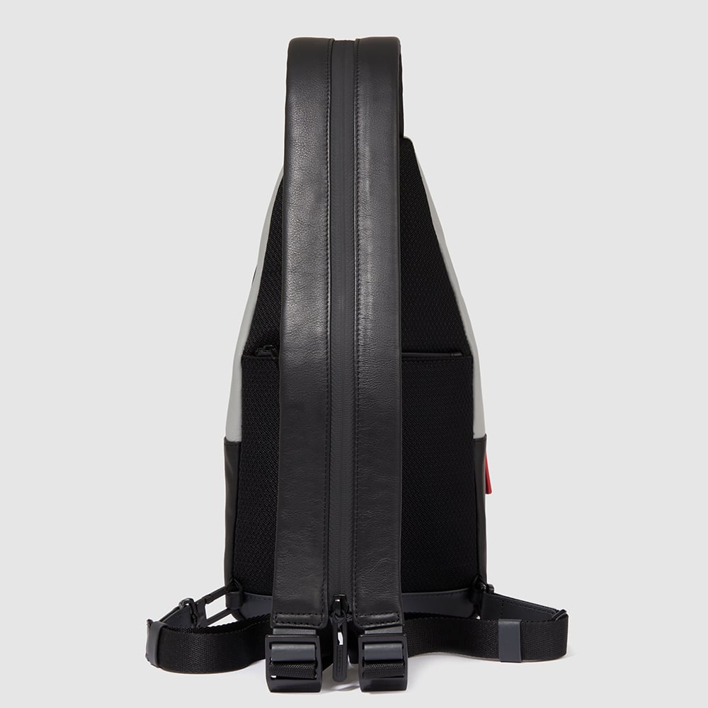 Adaptable chest bag that can be converted into a backpack with RFID protection, pockets for Airpods®, and connector. PIQUADRO Grey