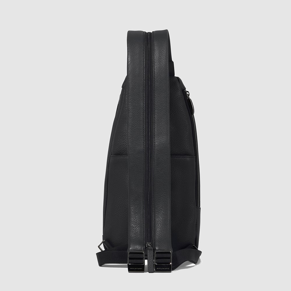 Adaptable chest bag with RFID protection and headphone jack pocket. PIQUADRO Black