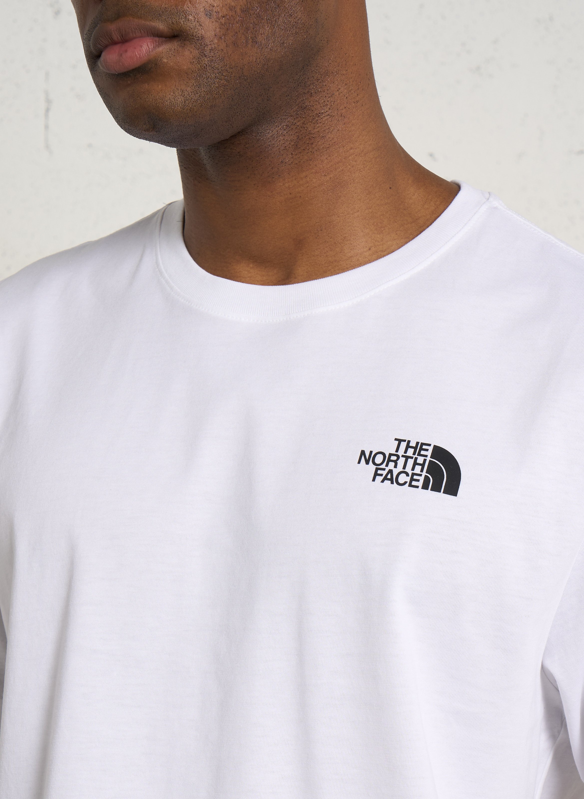 Straight round-neck cotton T-shirt with screen print THE NORTH FACE White