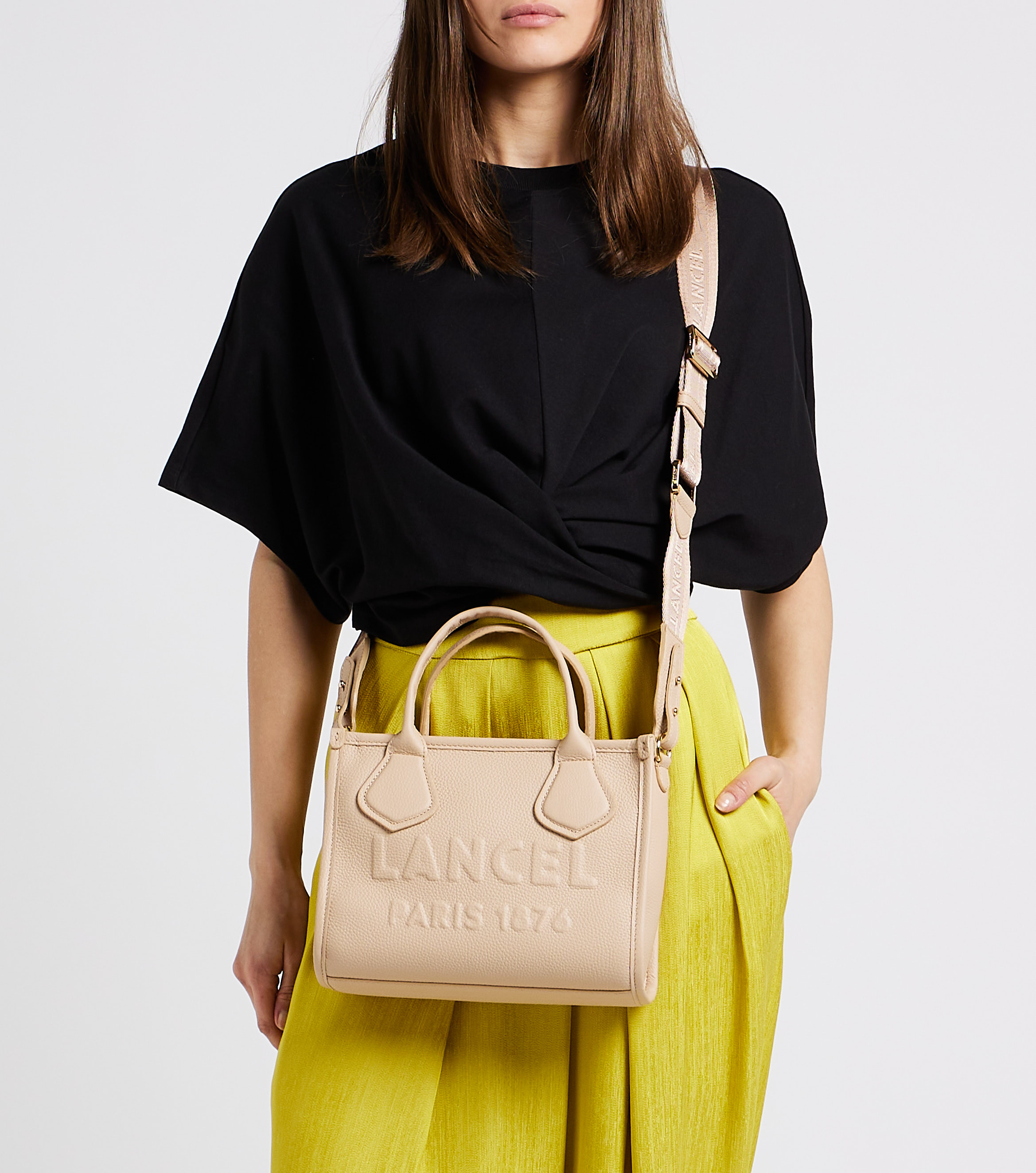 Embossed logo grained leather handbag LANCEL Beige