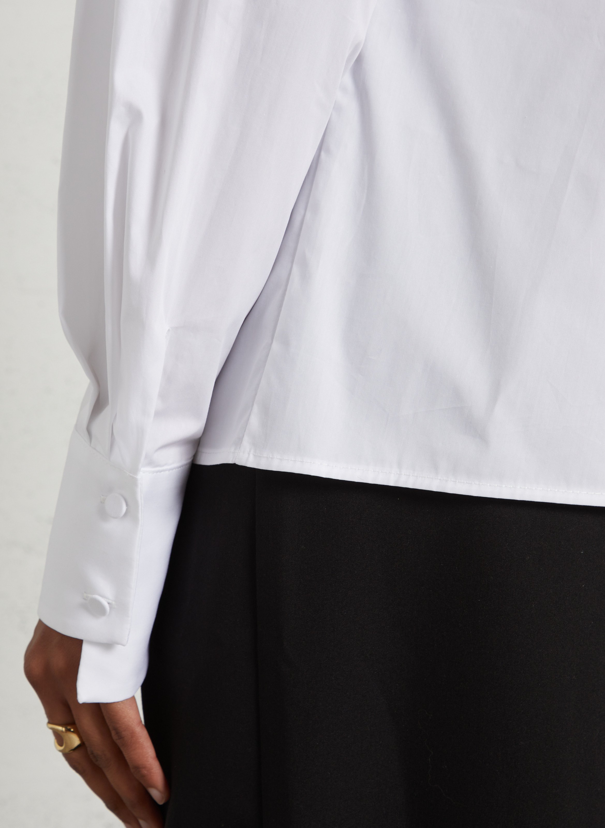 Fitted cotton shirt with shoulder pads and a flower brooch IMPERIAL White