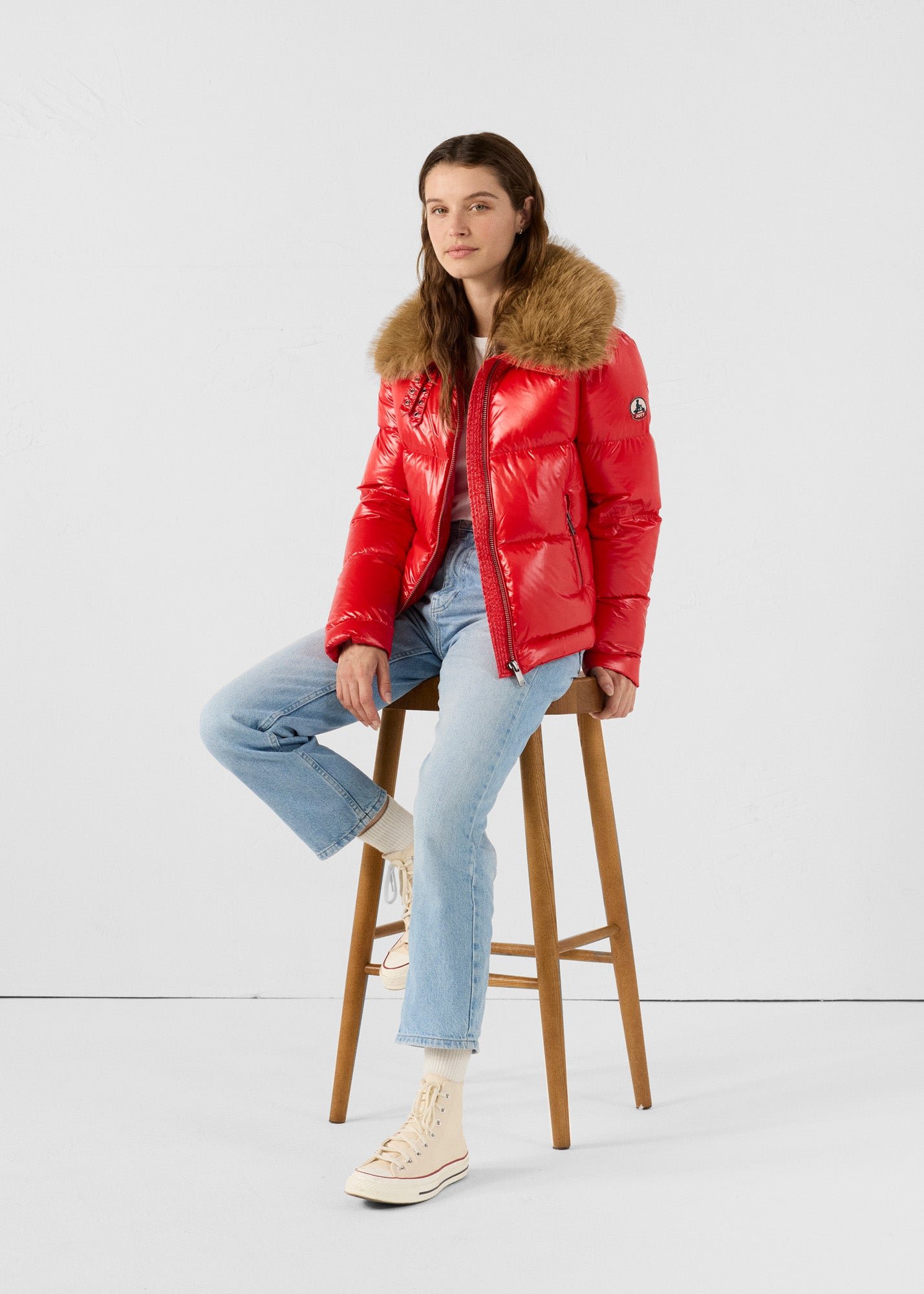 Shiny Nevada faux fur hooded puffer jacket for extreme cold. Red
