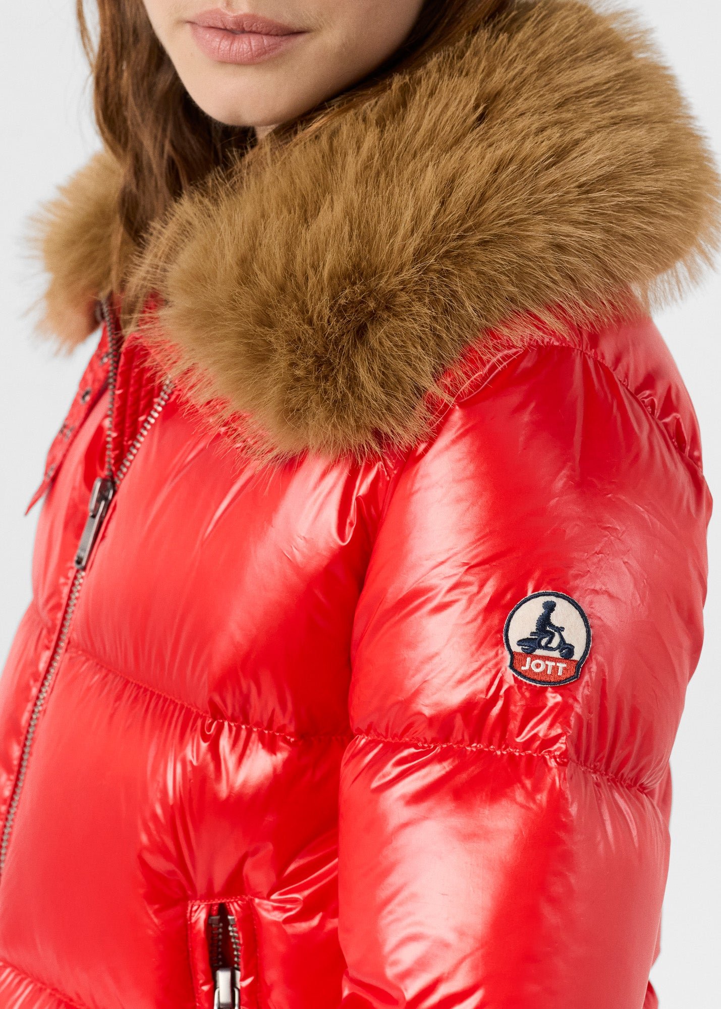 Shiny Nevada faux fur hooded puffer jacket for extreme cold. Red