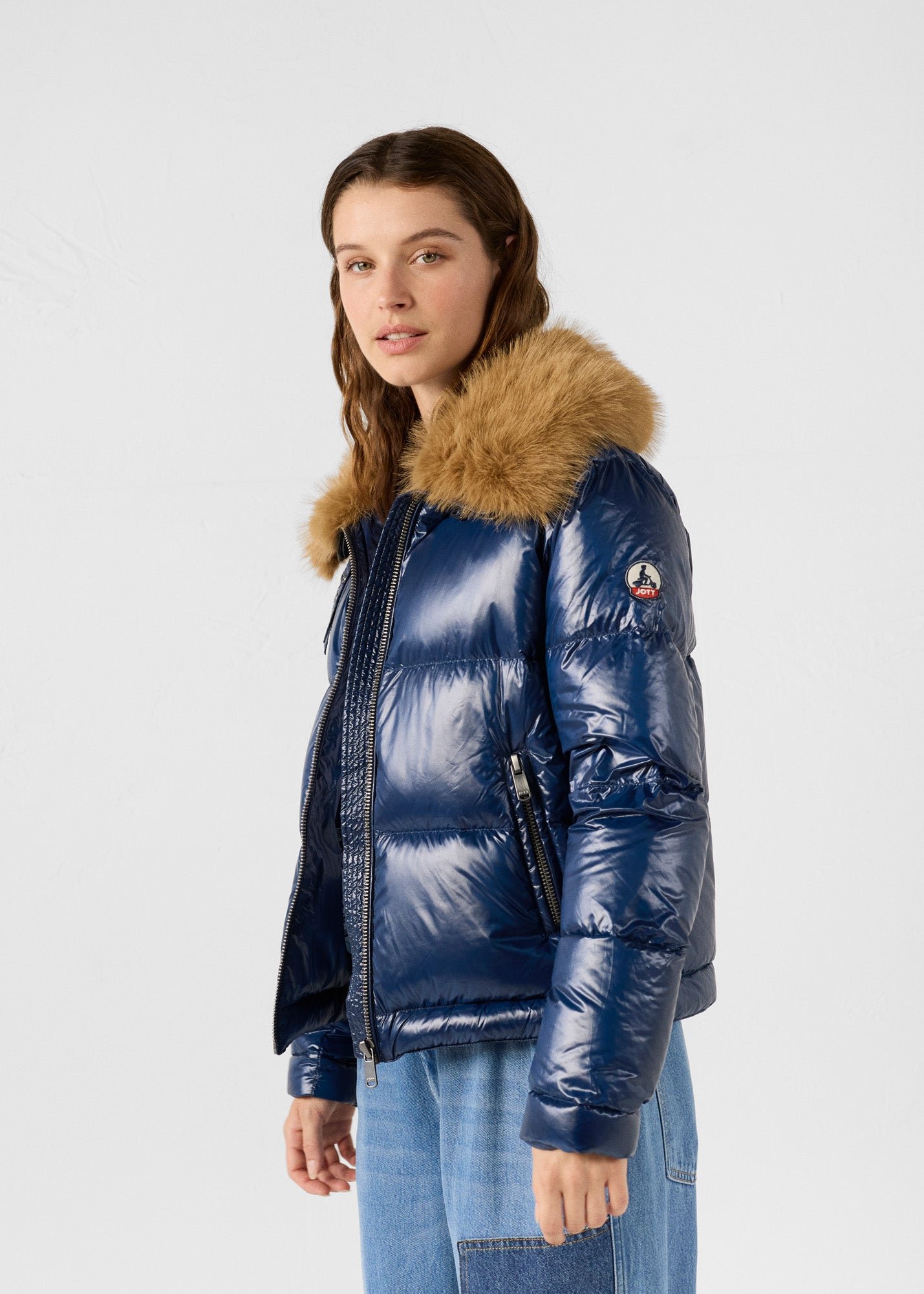 Shiny Nevada faux fur hooded puffer jacket for extreme cold. JOTT Blue
