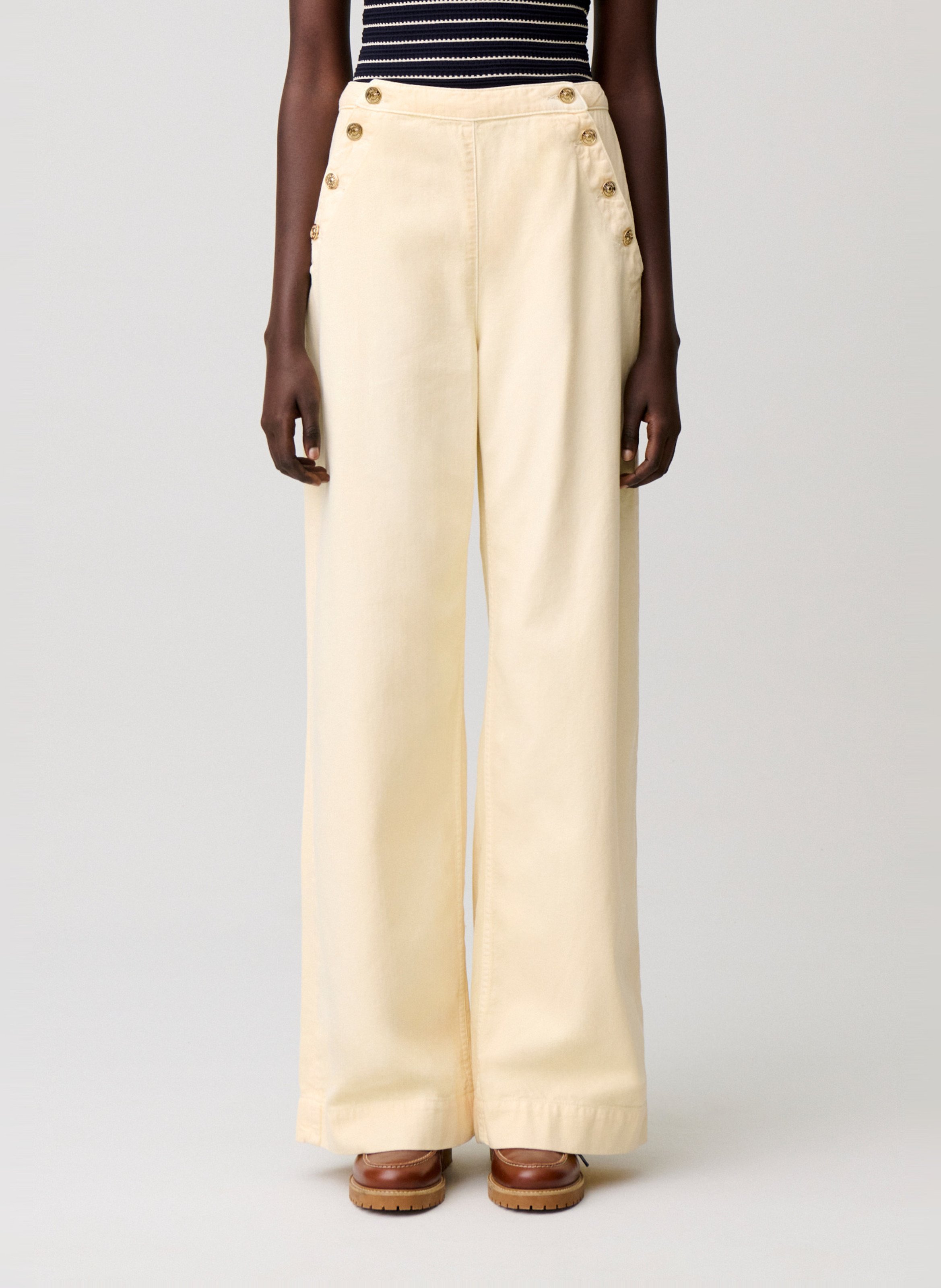 Wijde broek met denim overgooier. CLAUDIE PIERLOT