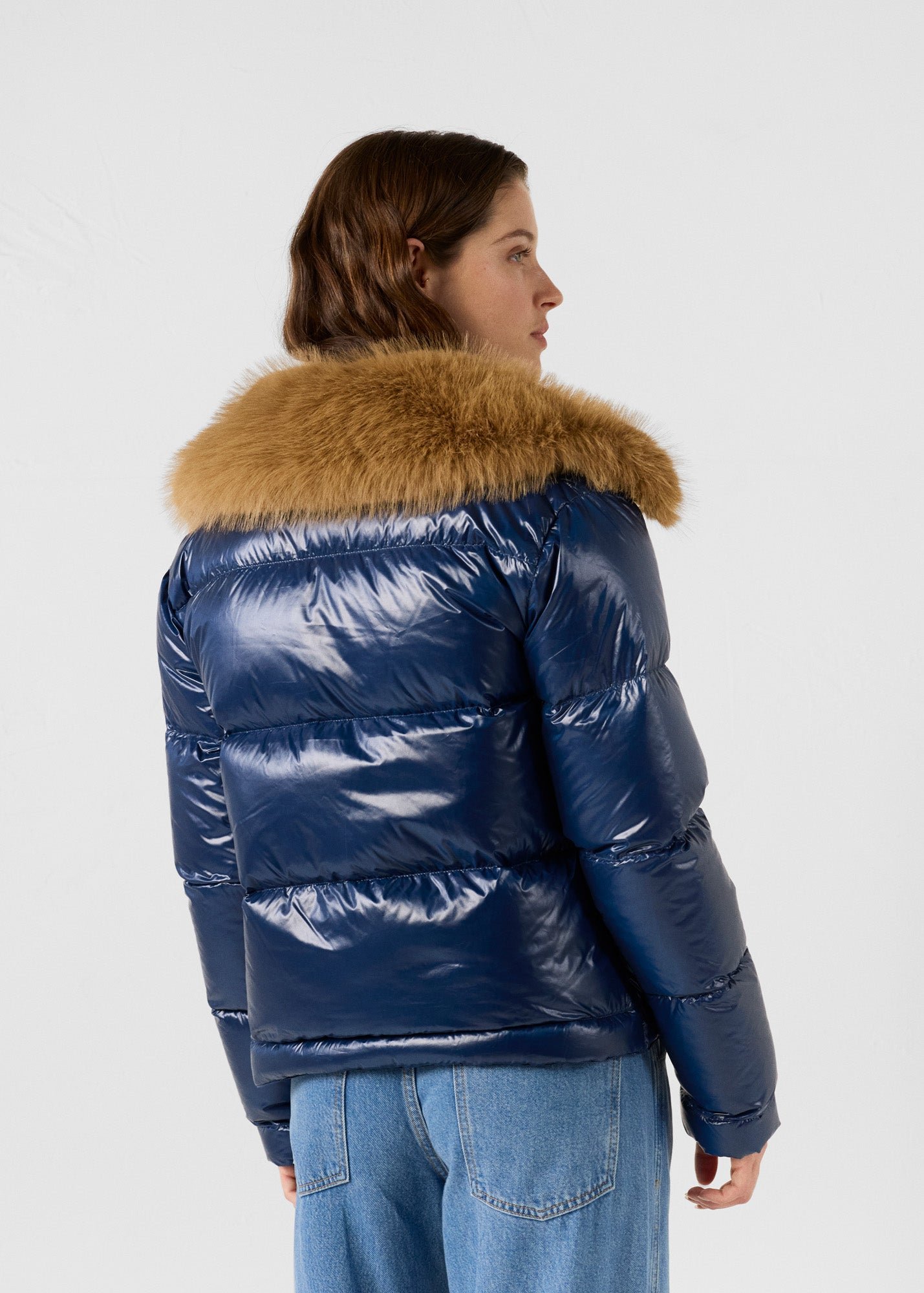 Shiny Nevada faux fur hooded puffer jacket for extreme cold. JOTT Blue