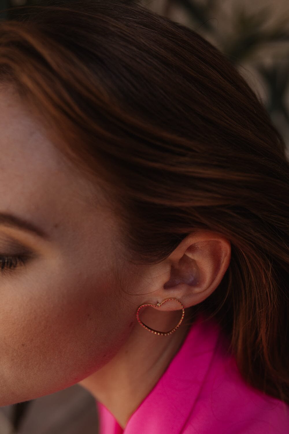 Large heart-shaped stud earrings in silver-plated. Silver