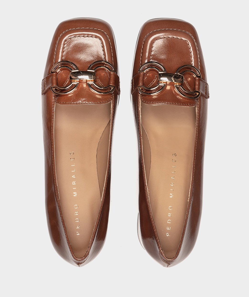 Brown high heel shoes with metal ornament. PEDRO MIRALLES Brown