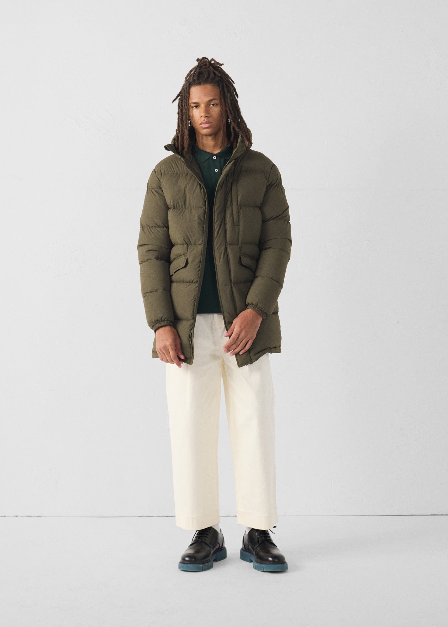 Mid-length stretch cold weather puffer coat by Scott. JOTT Green