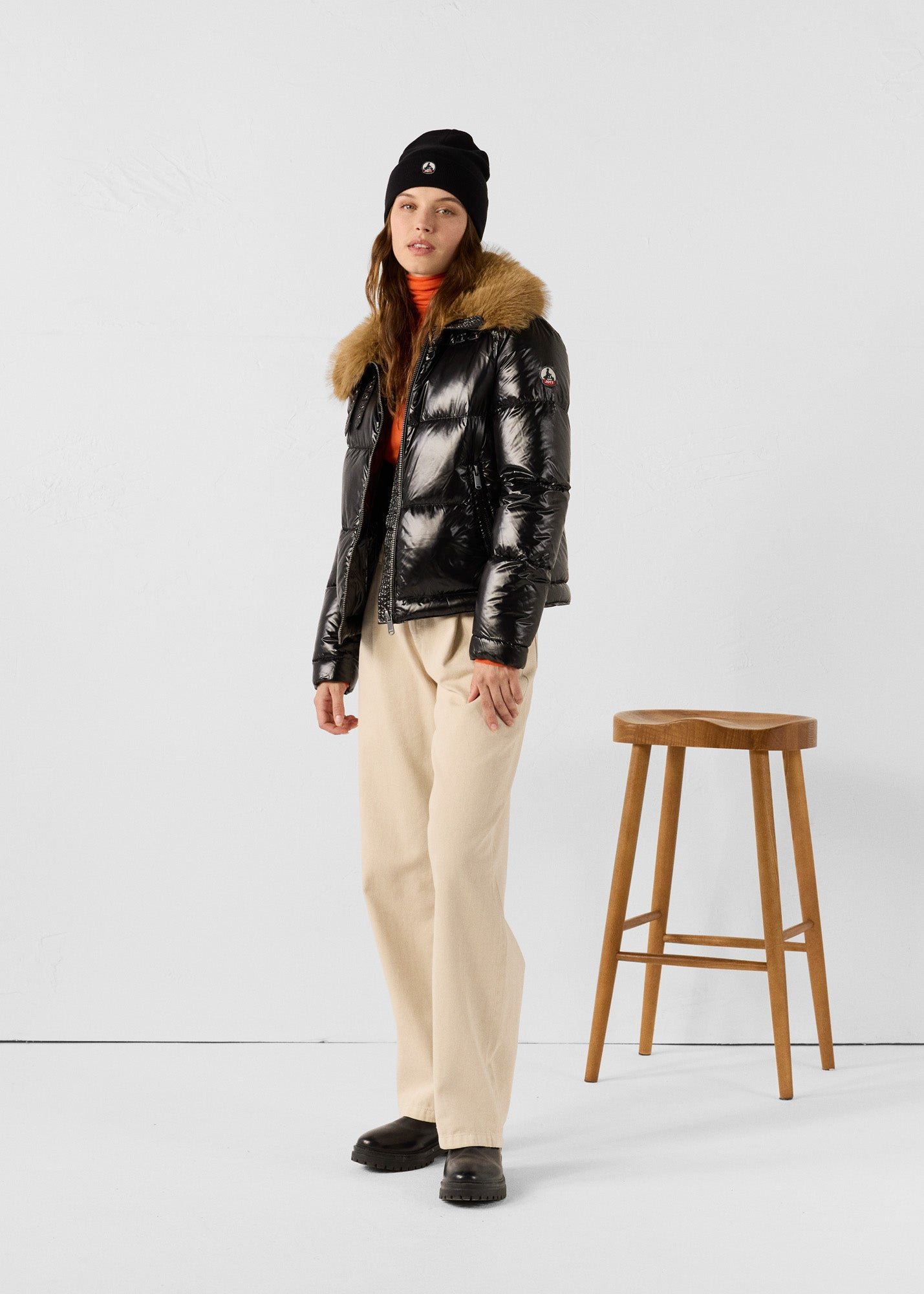 Shiny Nevada faux fur hooded puffer jacket for extreme cold. JOTT Black