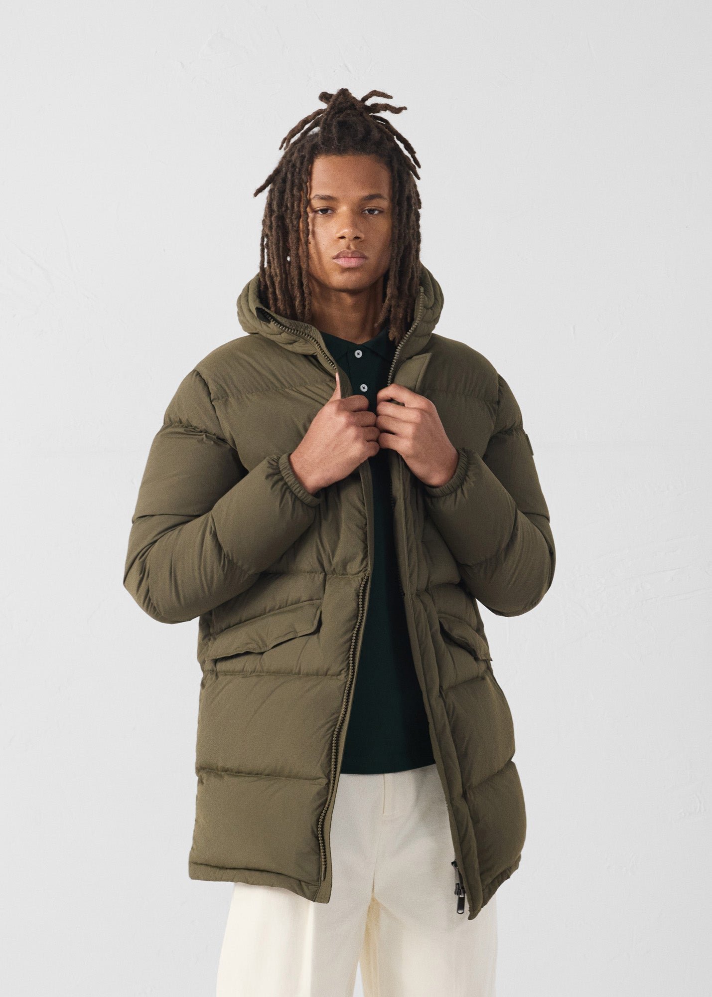 Mid-length stretch cold weather puffer coat by Scott. JOTT Green