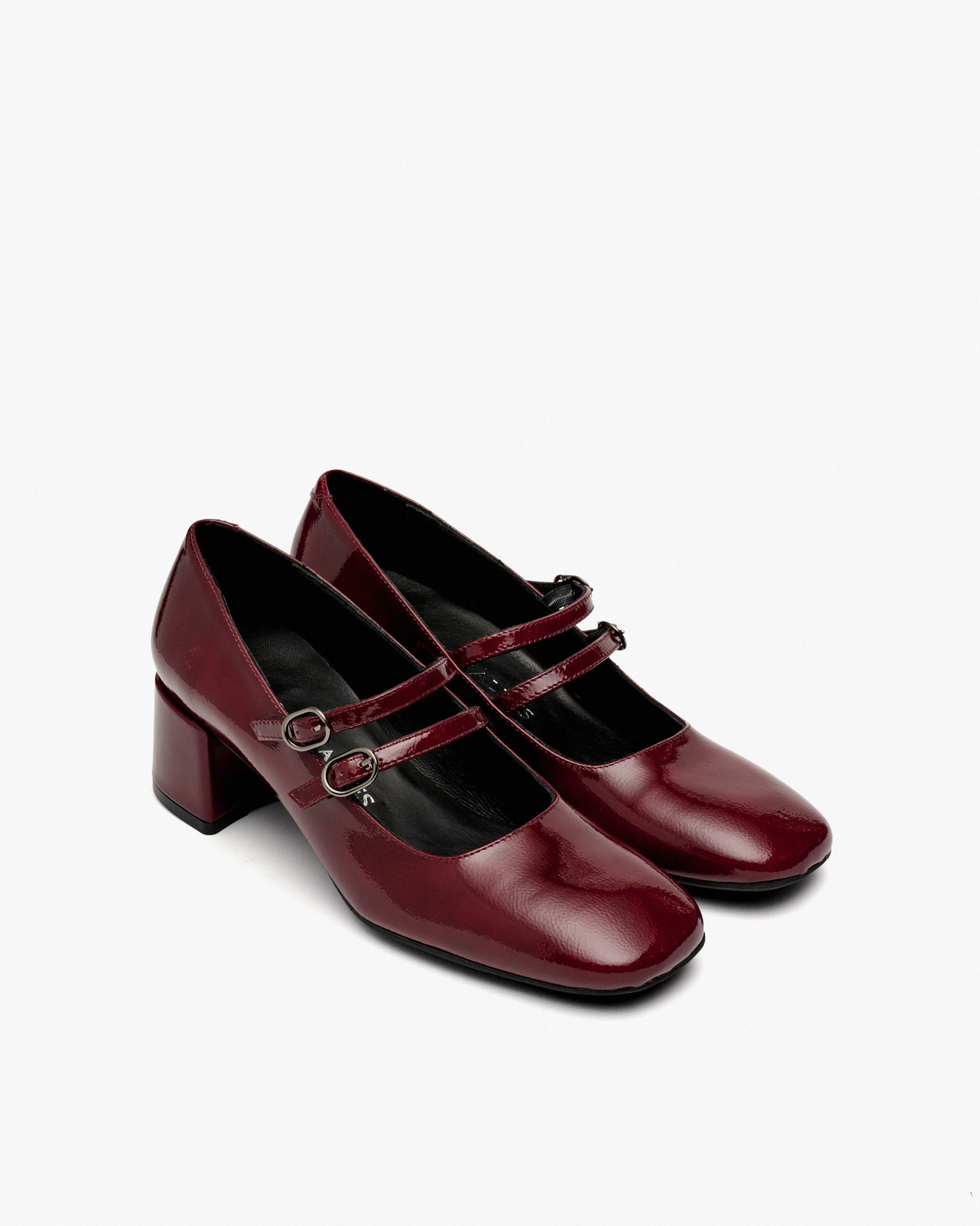 High-heeled patent leather shoes. PEDRO MIRALLES Red