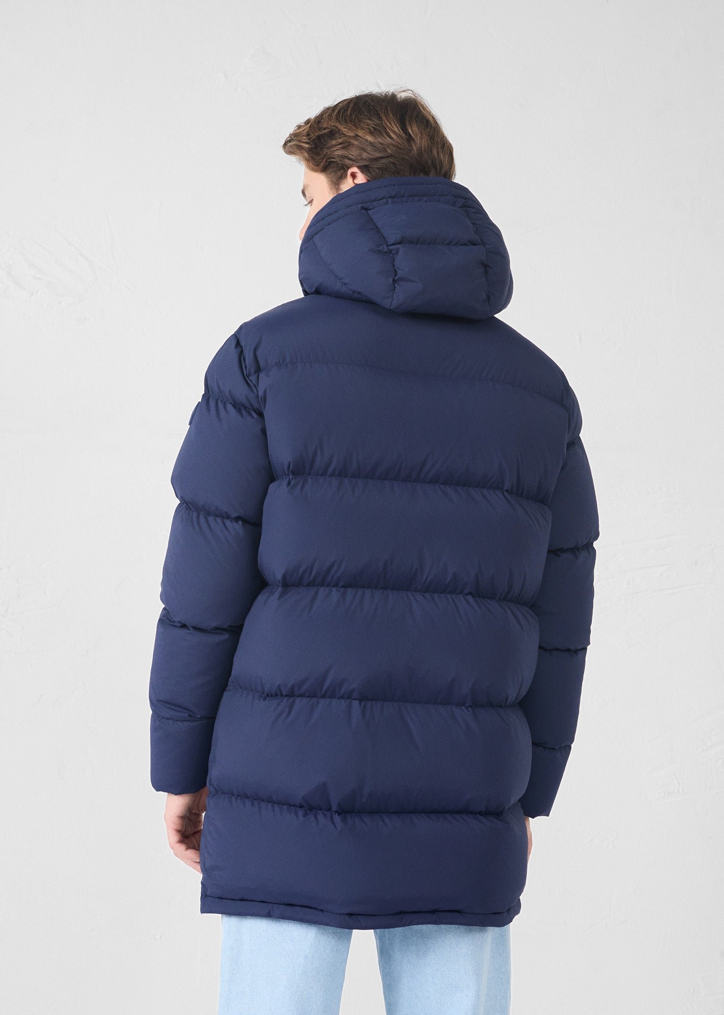 Mid-length stretch cold weather puffer coat by Scott. JOTT Blue