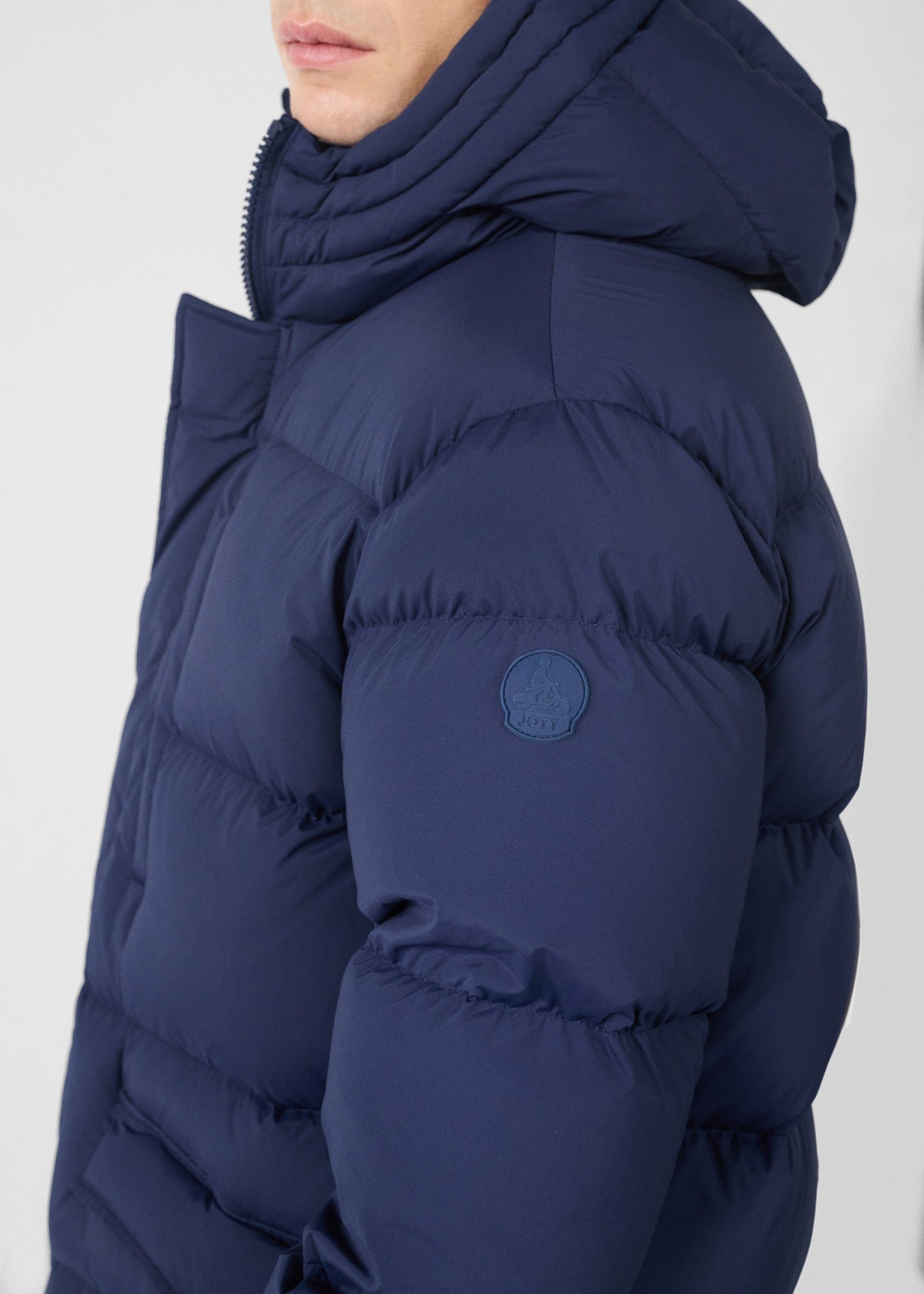 Mid-length stretch cold weather puffer coat by Scott. JOTT Blue