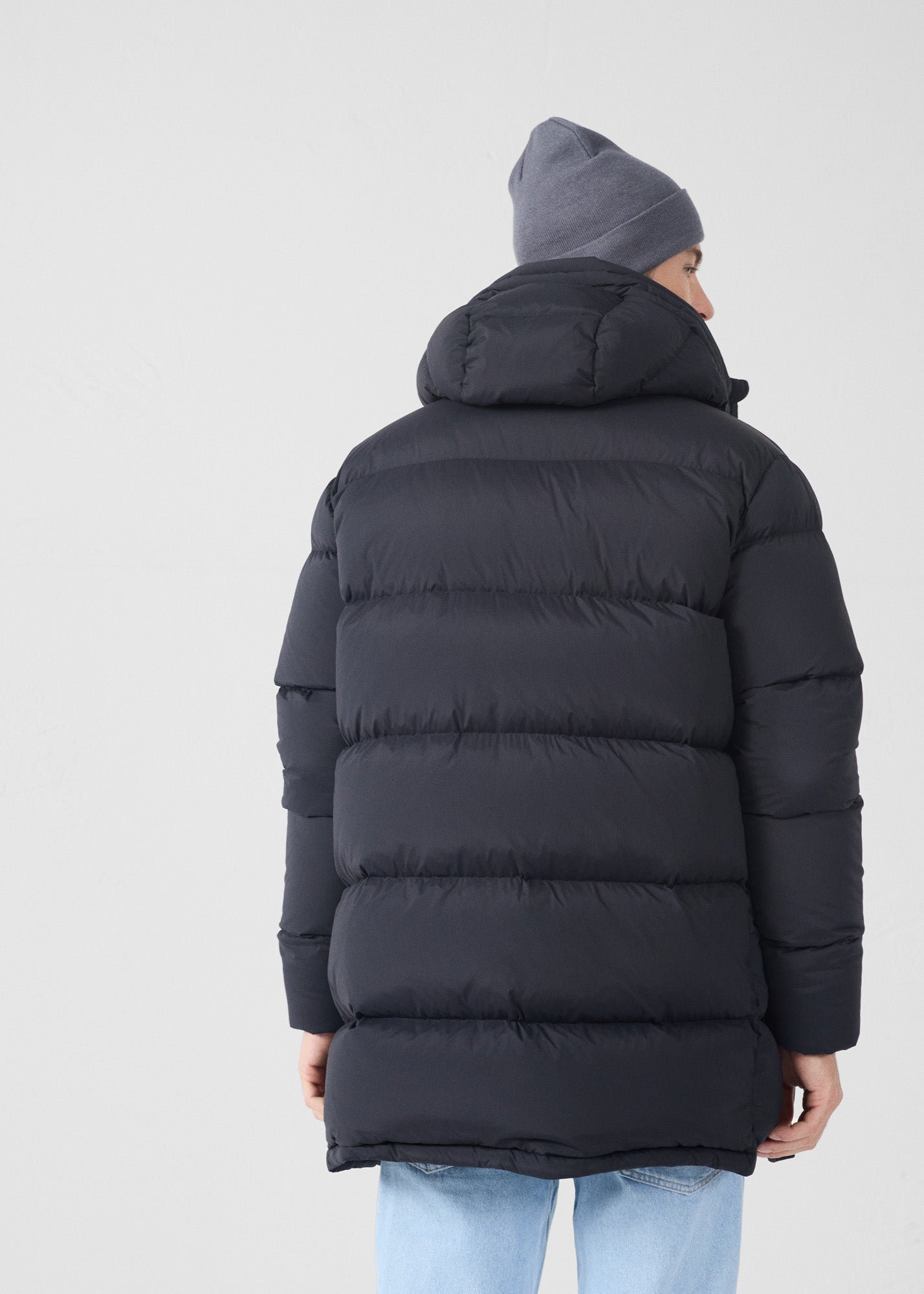 Mid-length stretch cold weather puffer coat by Scott. JOTT Black