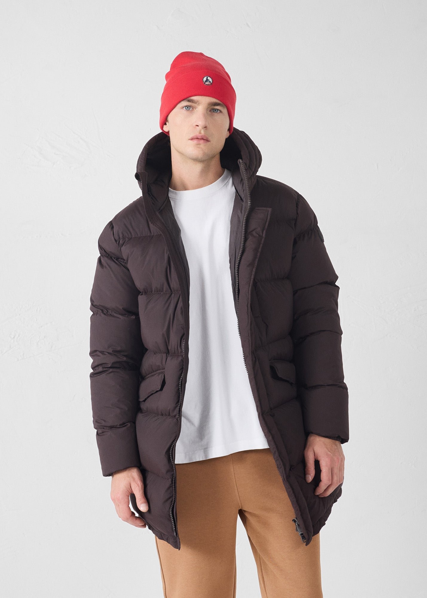 Black stretch mid-length extreme cold down jacket by Scott. JOTT Brown