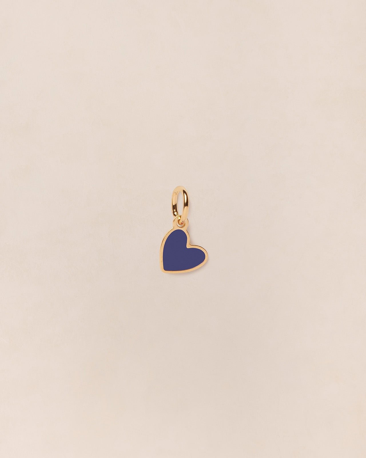 The small heart-shaped pendant in colorful and 24-carat fine gold EMOI EMOI