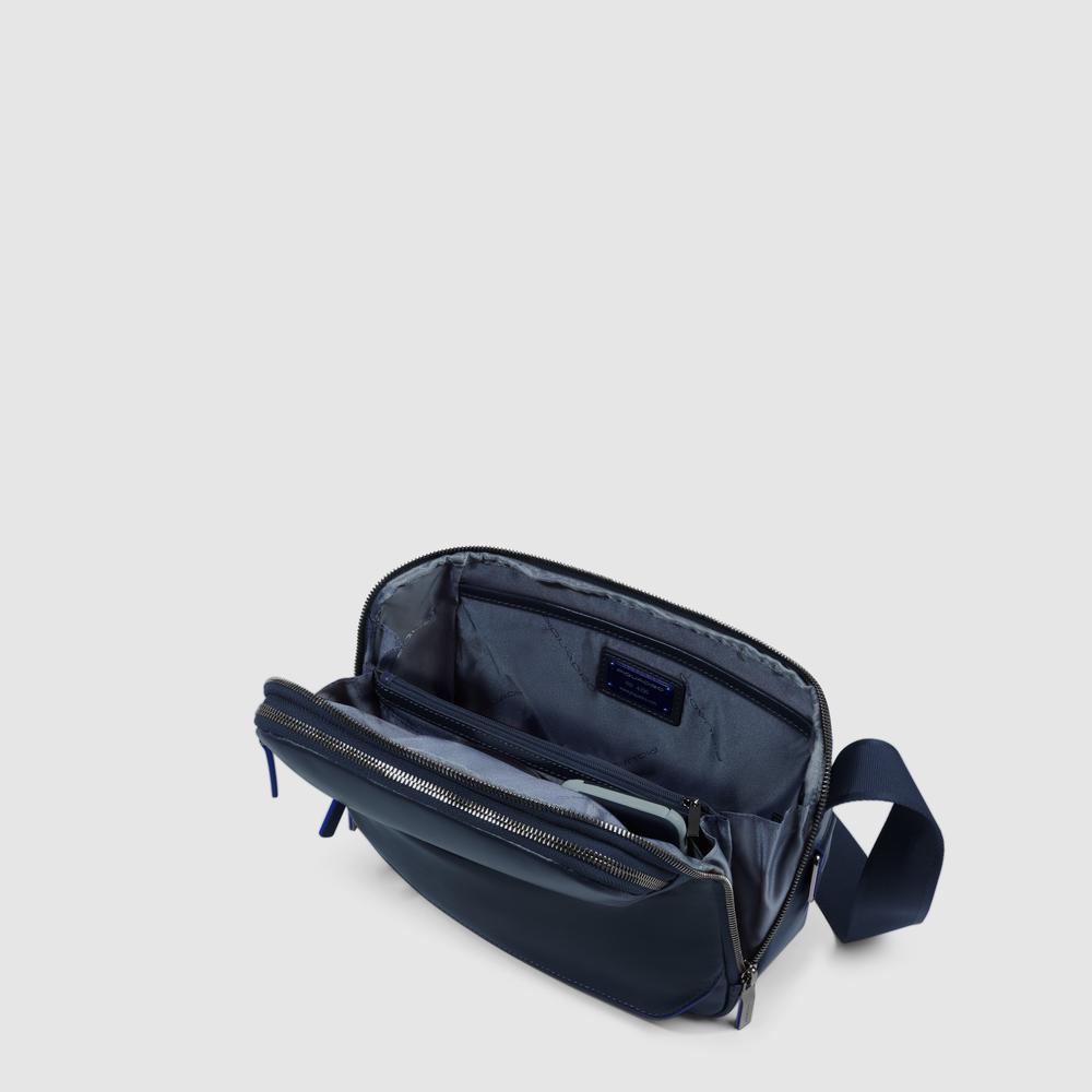 Customizable crossbody bag for iPad® mini with pockets for mouse and airpods and RFID protection. PIQUADRO Blue