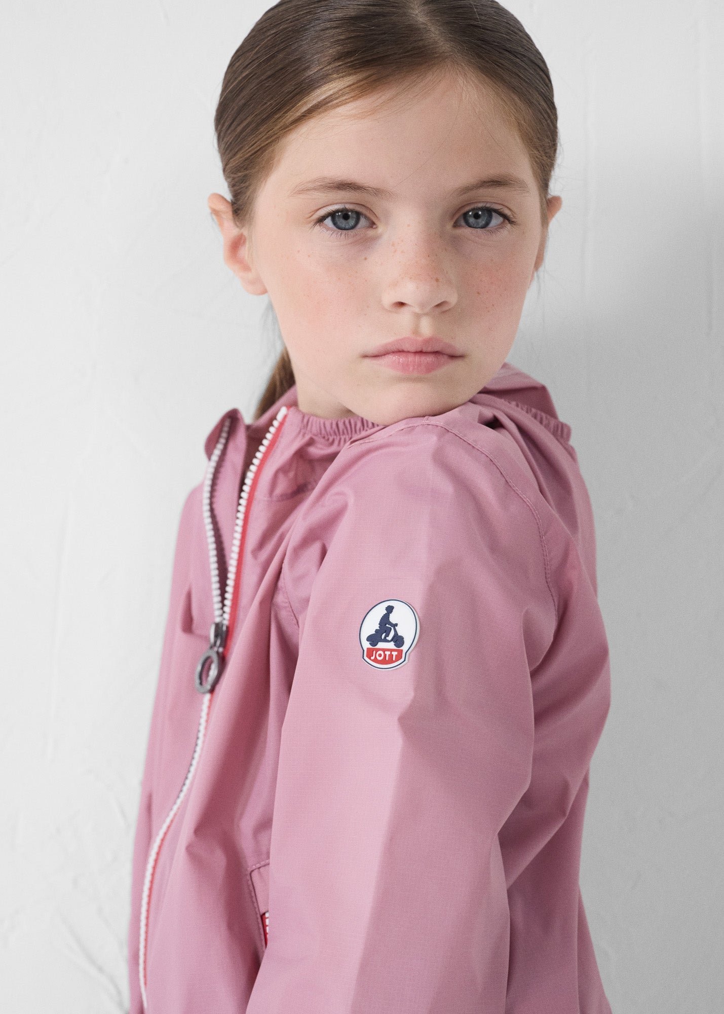 Packable kids raincoat Corrie JOTT Pink