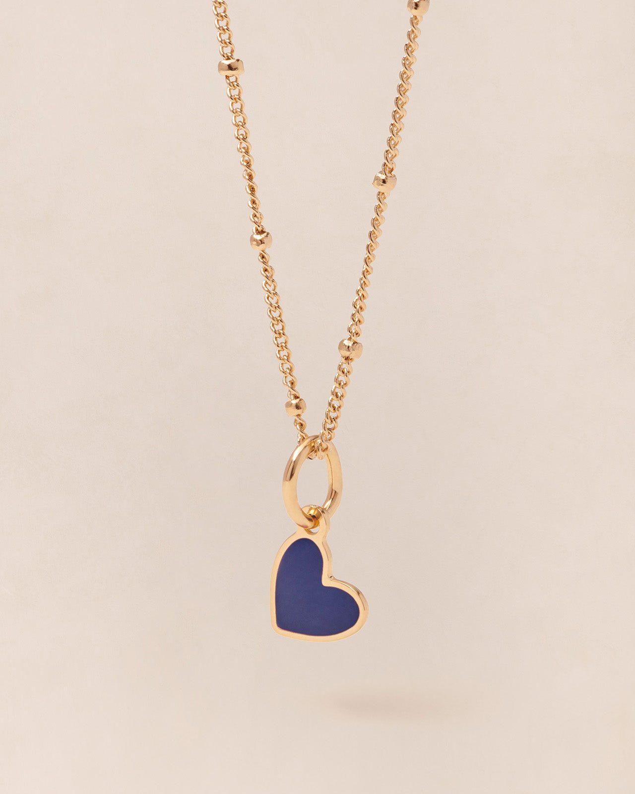 The small heart-shaped pendant in colorful and 24-carat fine gold EMOI EMOI Blue