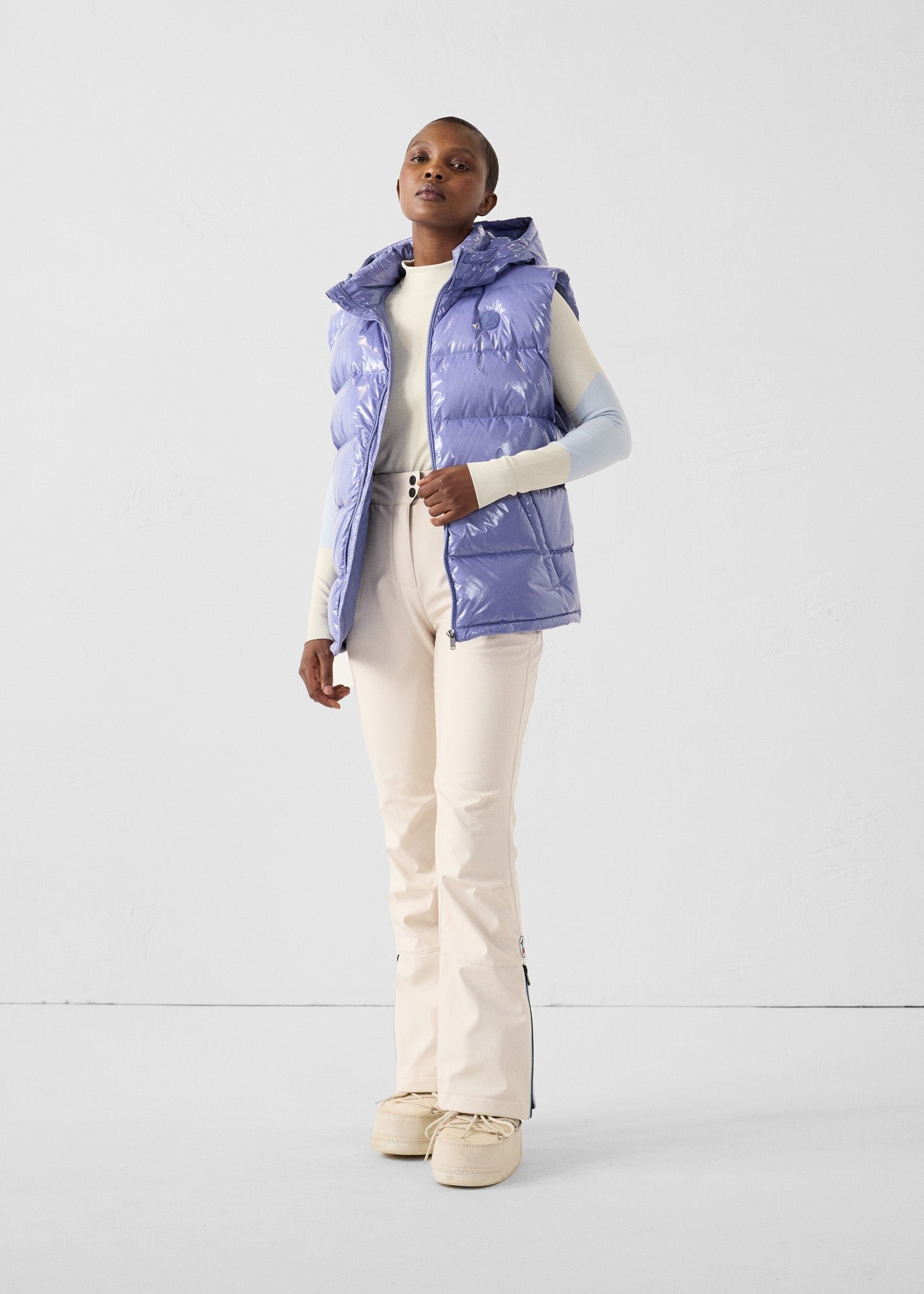 Padded sleeveless down jacket for extreme cold weather. JOTT Pink