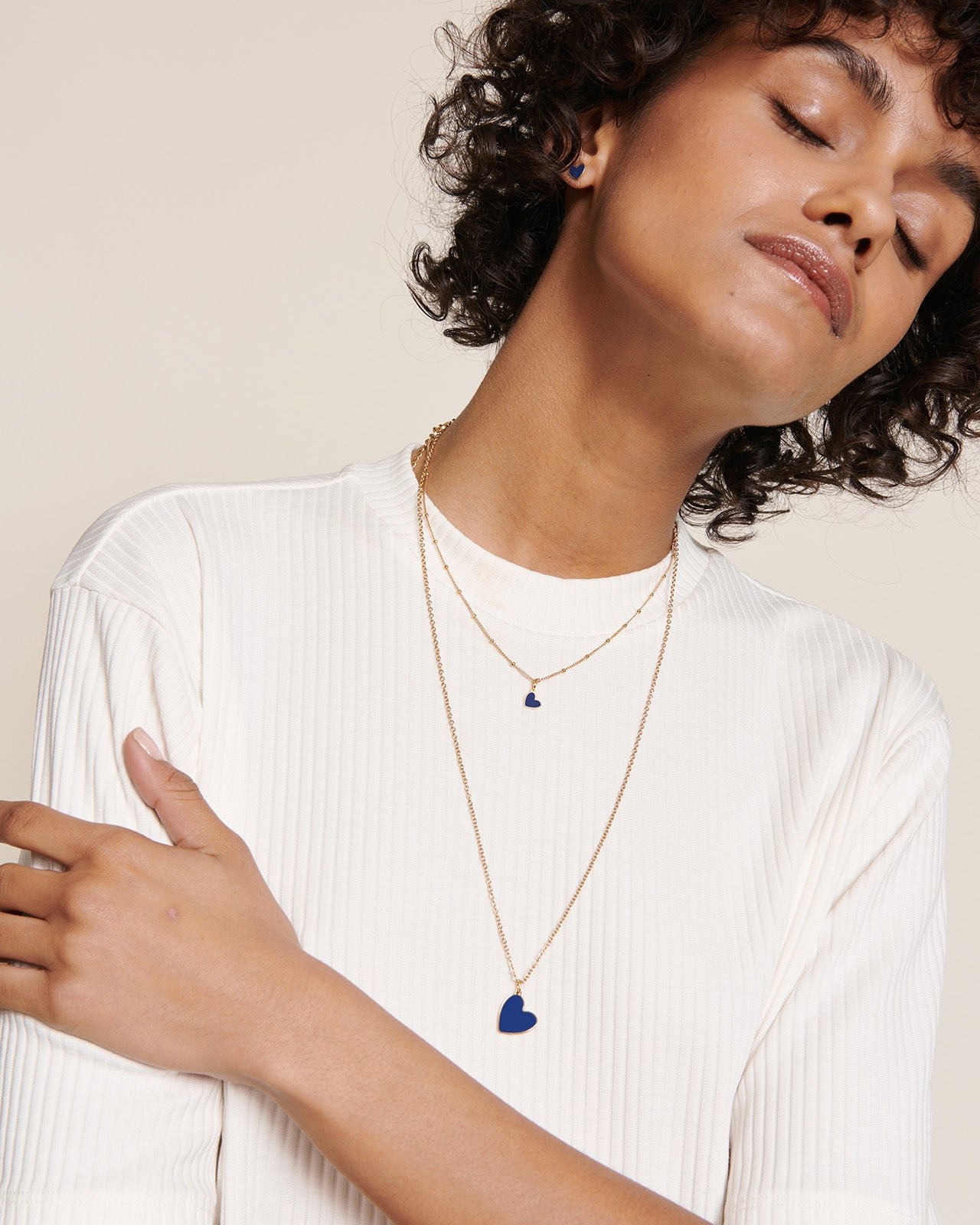 The small heart-shaped pendant in colorful and 24-carat fine gold EMOI EMOI Blue