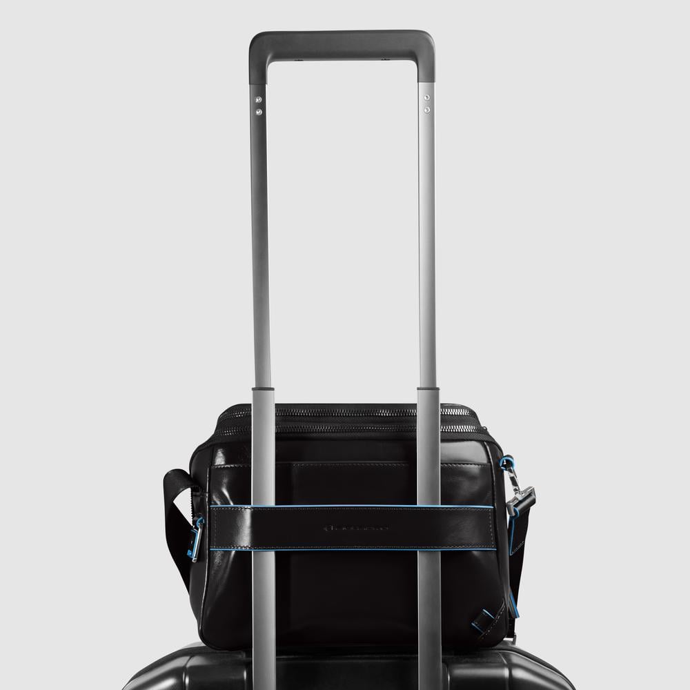 Customizable crossbody bag for iPad® mini with pockets for mouse and airpods and RFID protection. PIQUADRO Black