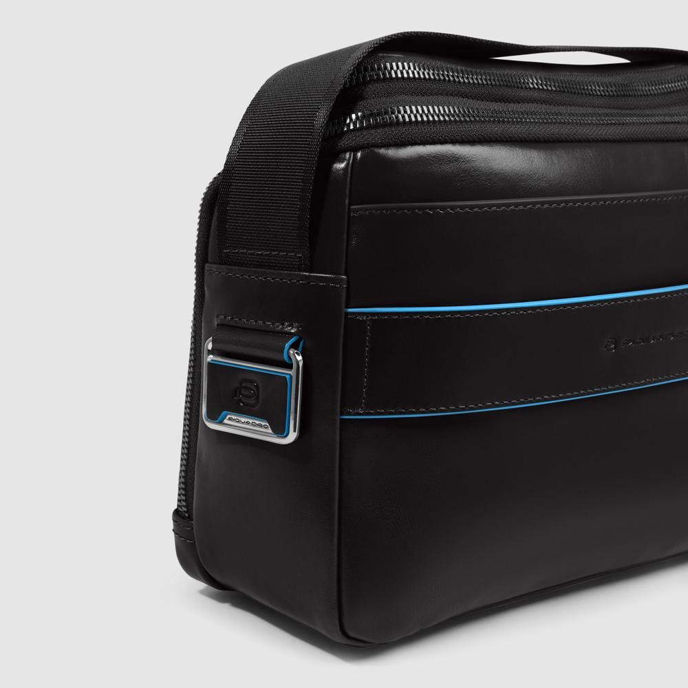 Customizable crossbody bag for iPad® mini with pockets for mouse and airpods and RFID protection. PIQUADRO Black