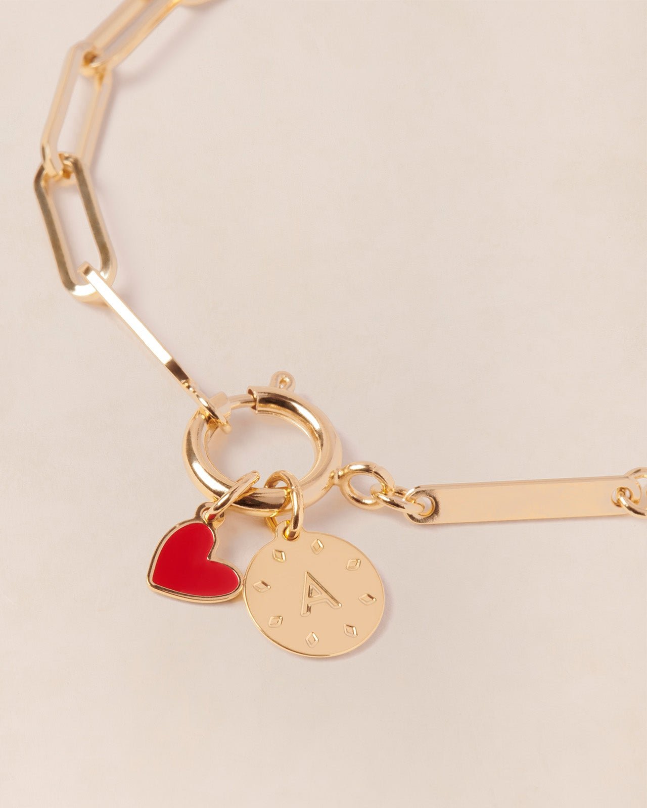 The small heart-shaped pendant in colorful and 24-carat fine gold EMOI EMOI Red