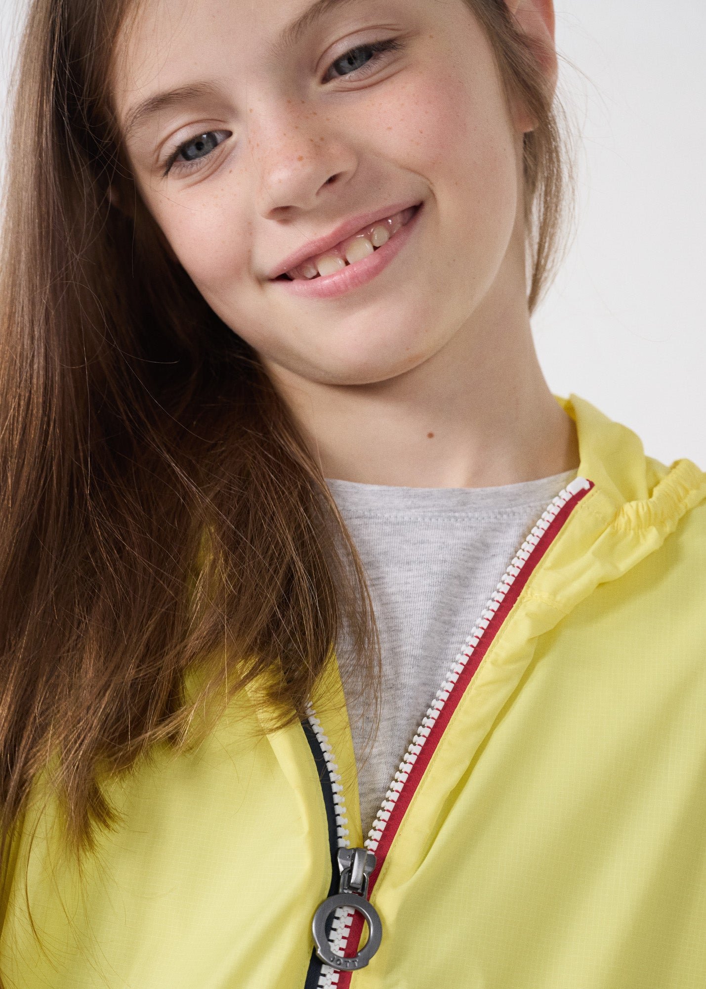 Packable kids raincoat Corrie JOTT Yellow