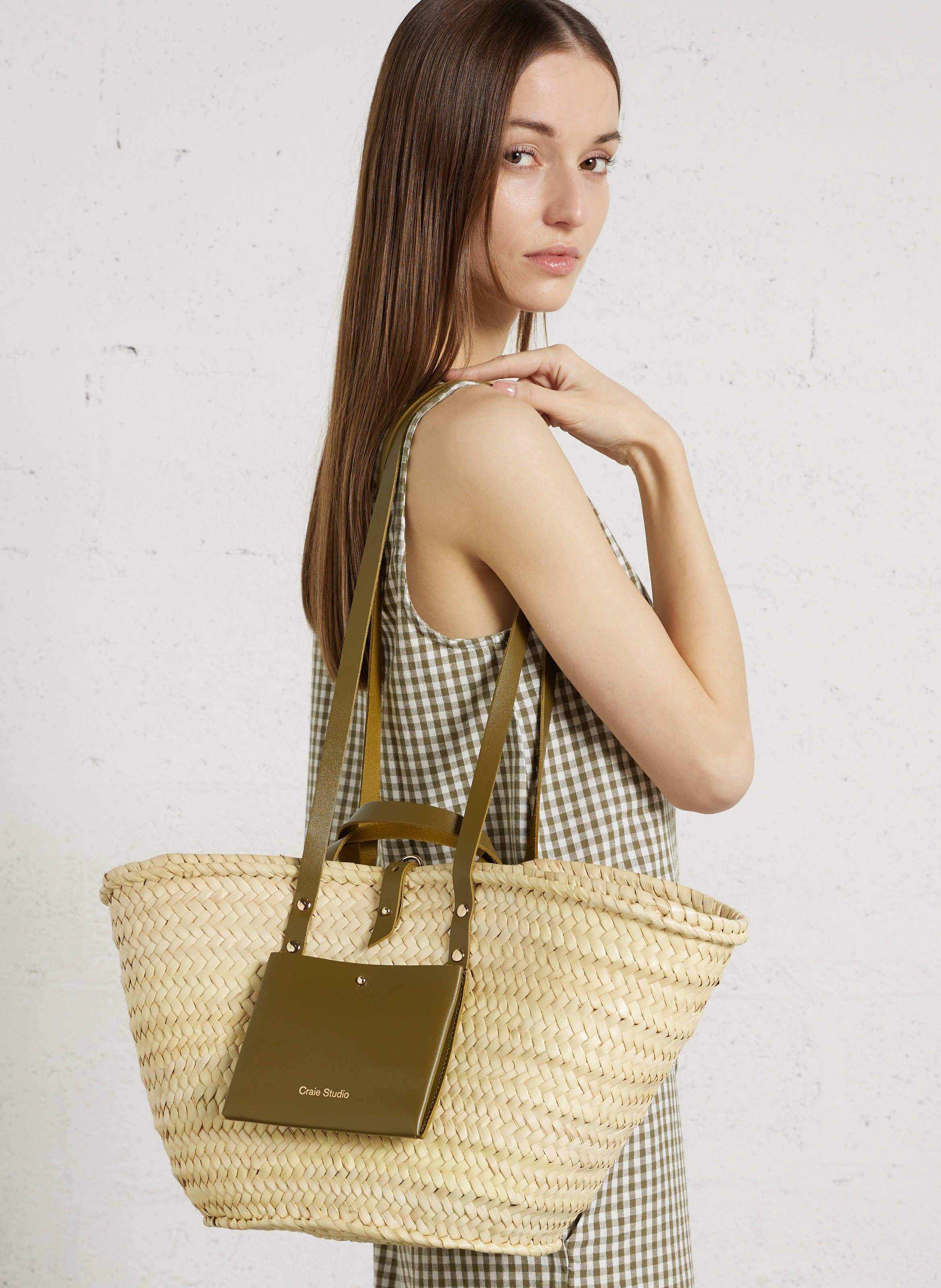 Gevlochten mand van doum CRAIE STUDIO Groen