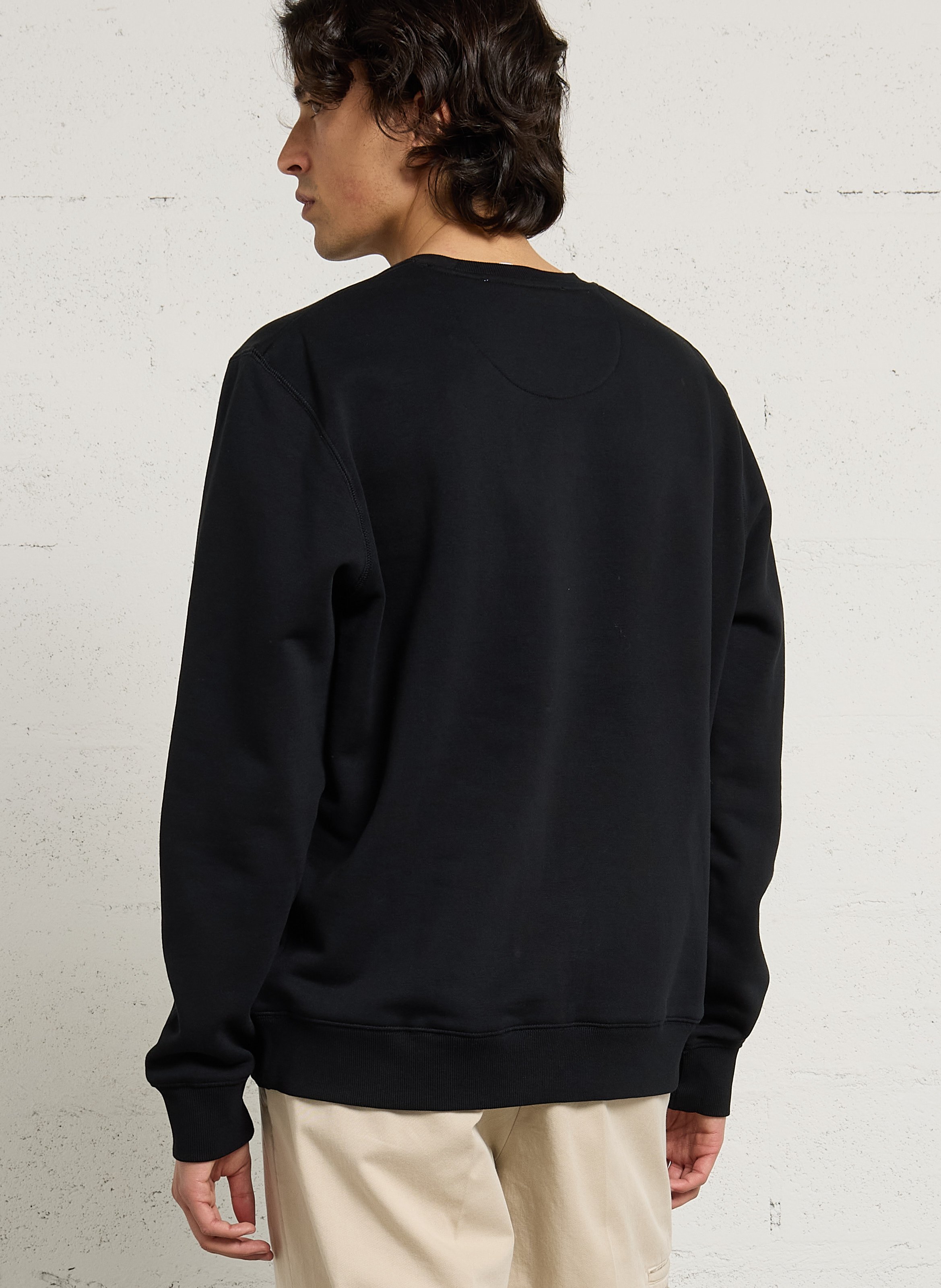 Weiter Pullover mit einfarbiger Stickerei der Marke. CHEVIGNON Schwarz