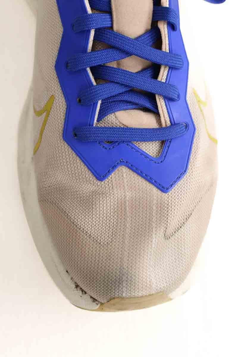 Baskets basses NIKE - Seconde Main Beige